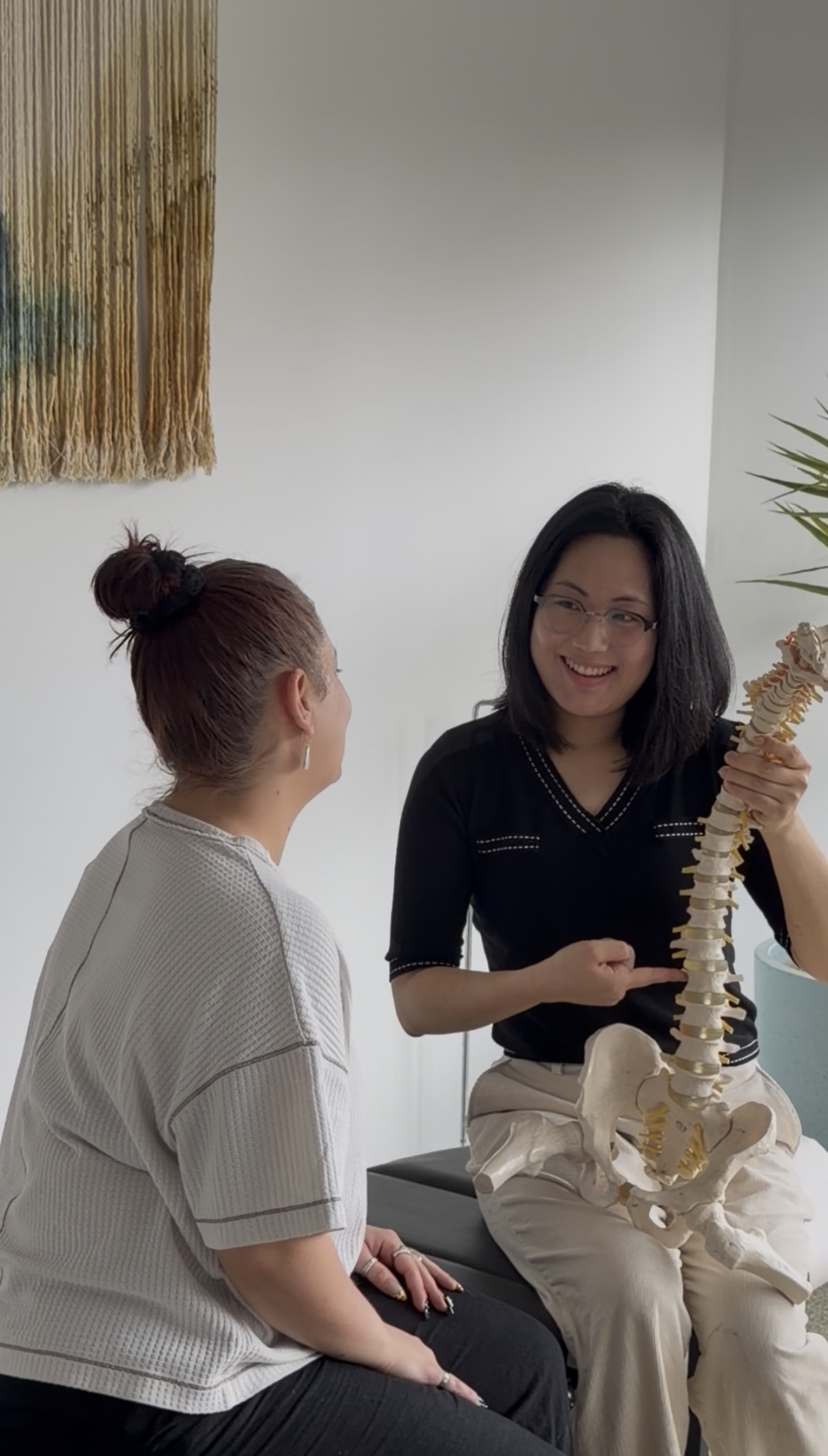 Dr Mia Ghil talking with a new patient at their first consultation