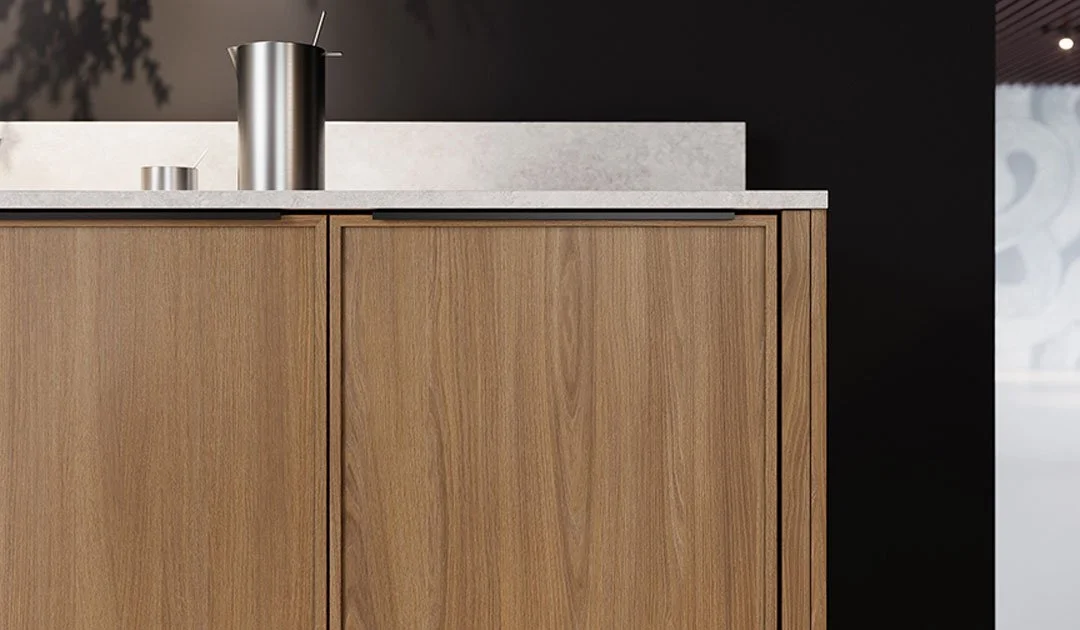 Slim shaker doors under a countertop workspace in a pantry.