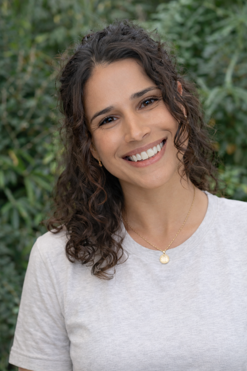 Professional portrait of Becca Rosenberg outdoors