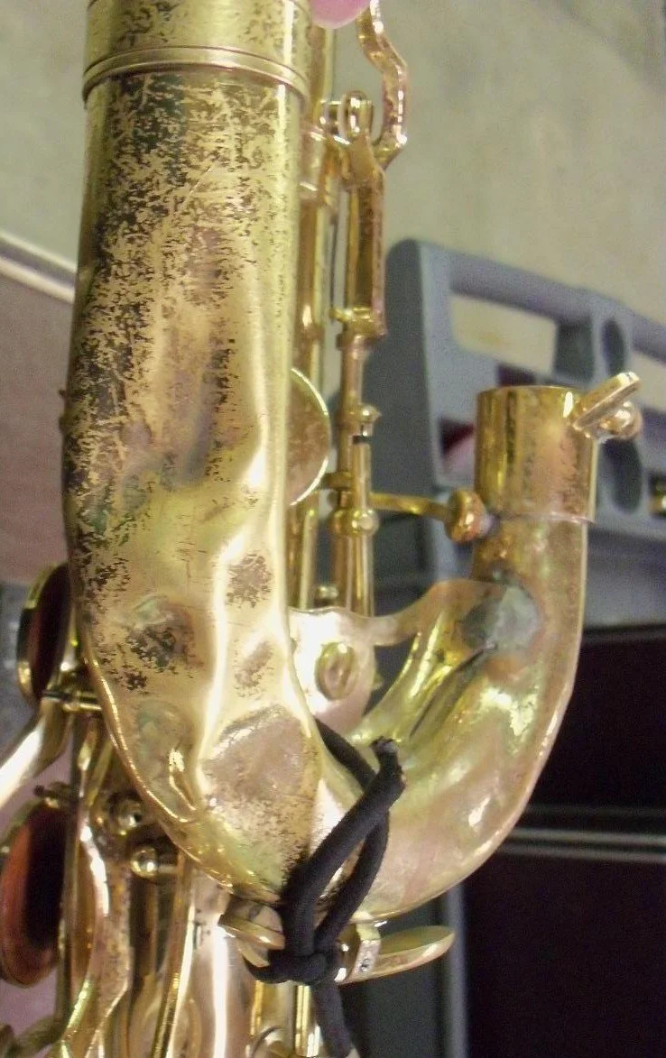 bashed baritone sax J-crook