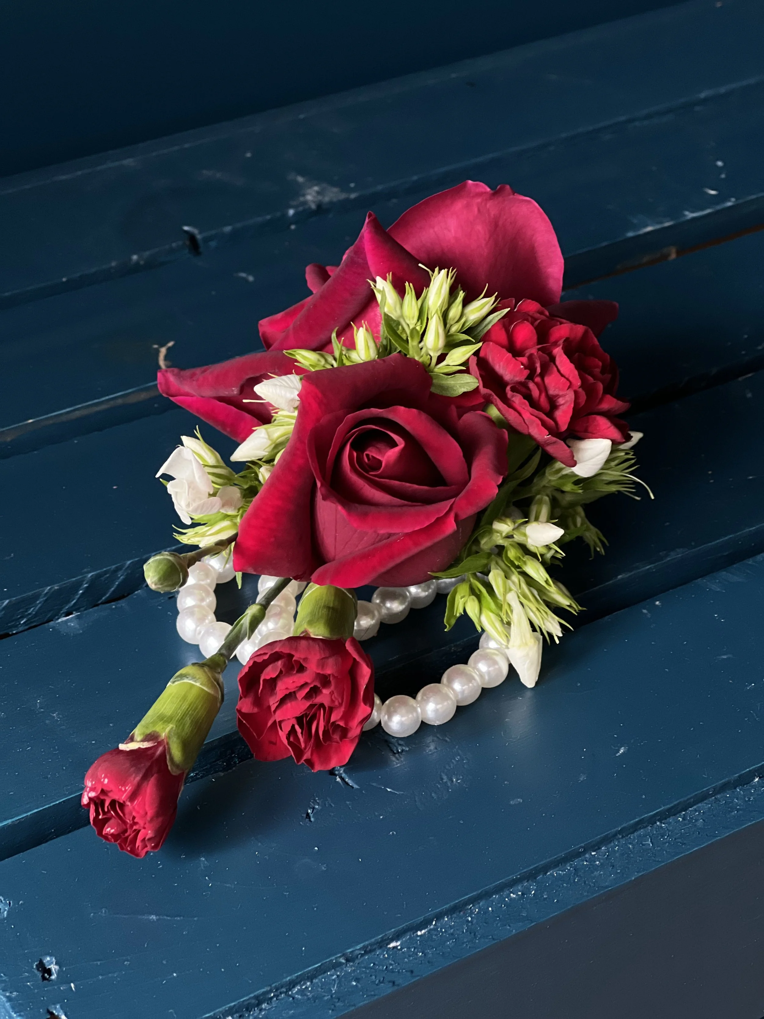 Portland OR custom corsage with red roses & carnations for a Portland wedding
