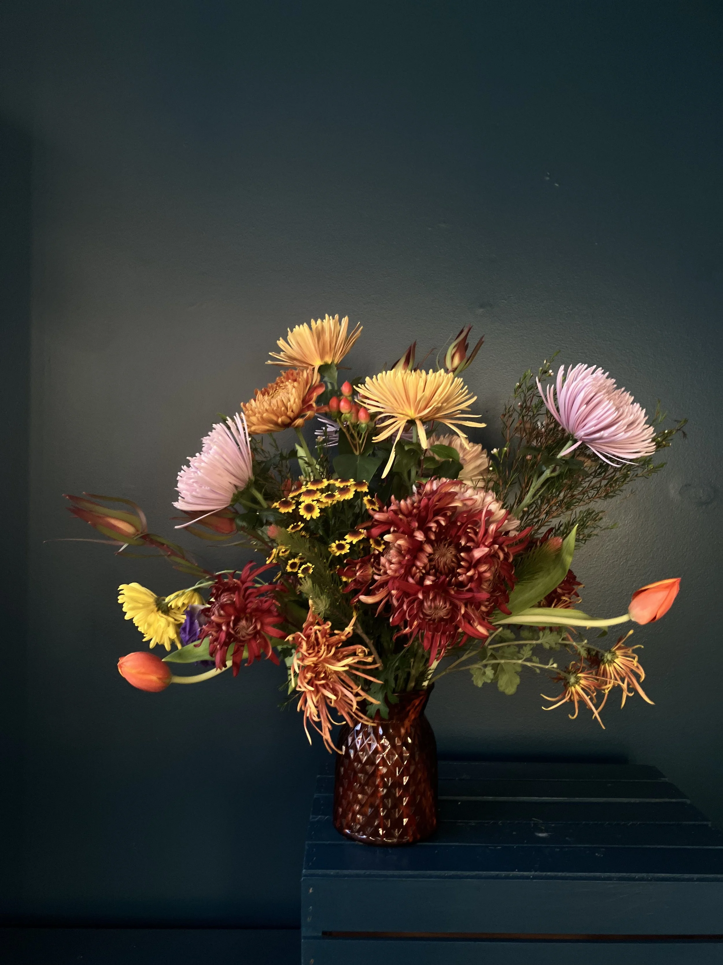 Large custom arrangement for Thanksgiving table with tulips/mums