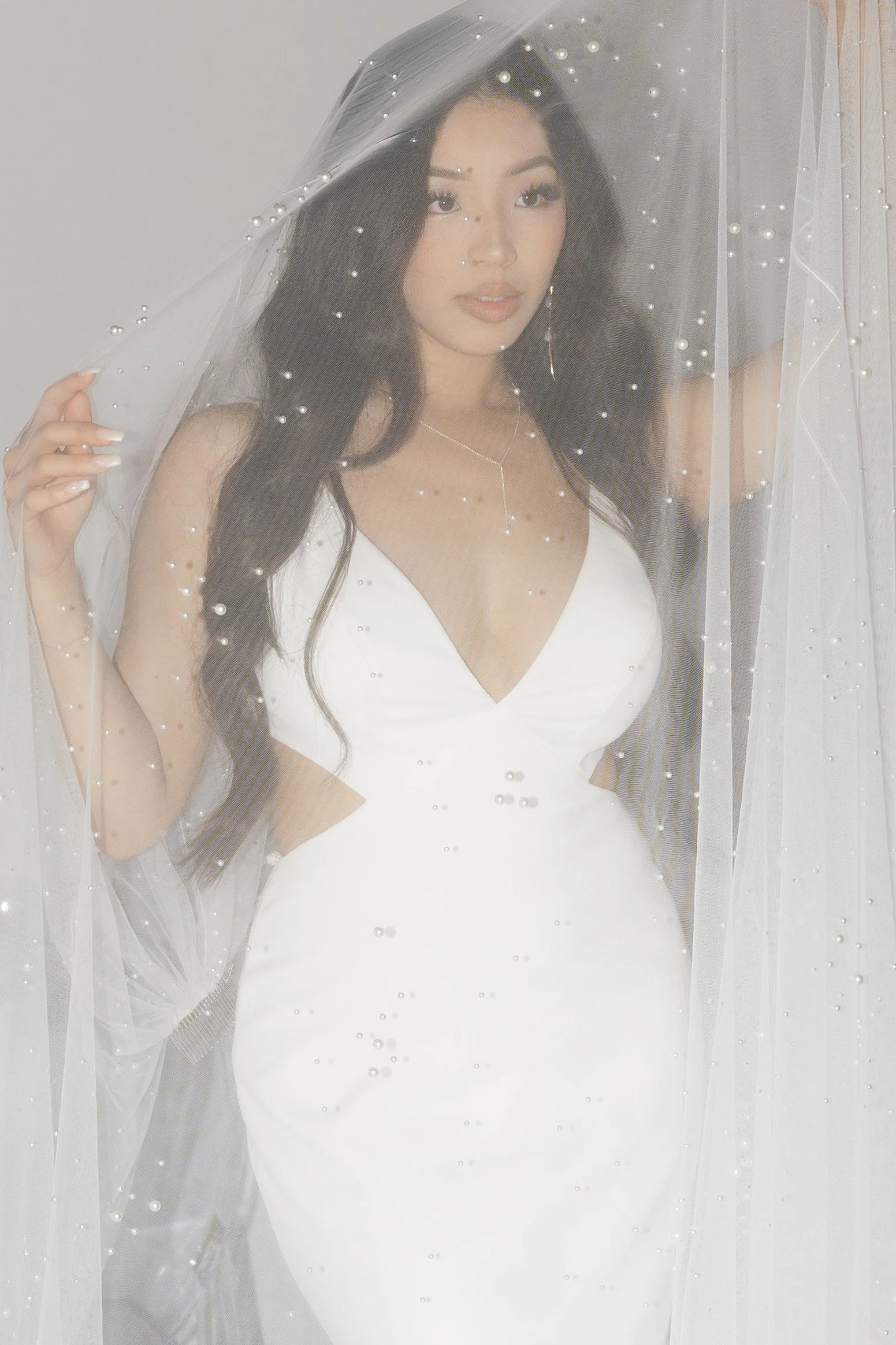 editorial bridal portrait with dew drop veil