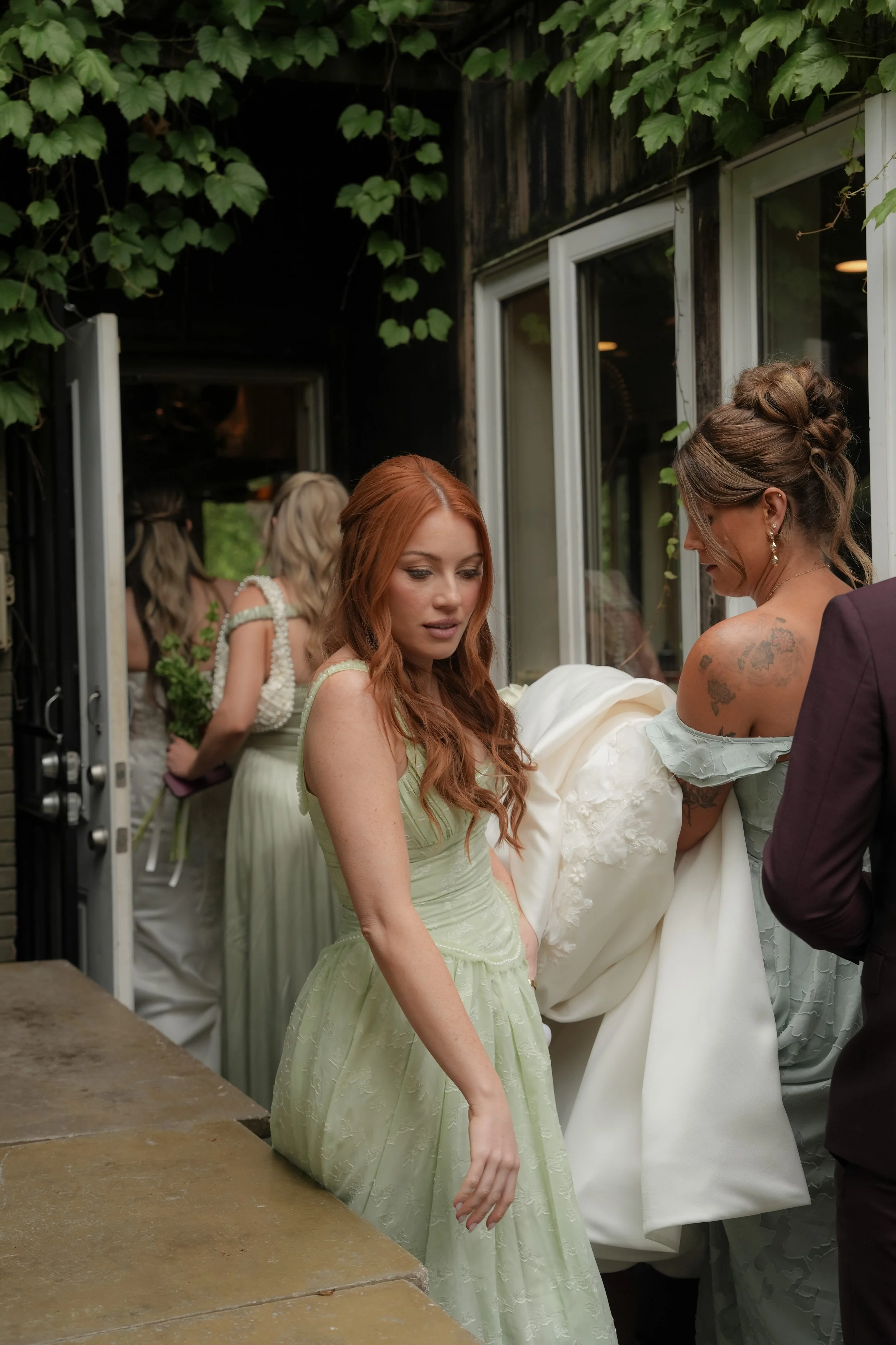 high-fashion bridesmaid in green dress