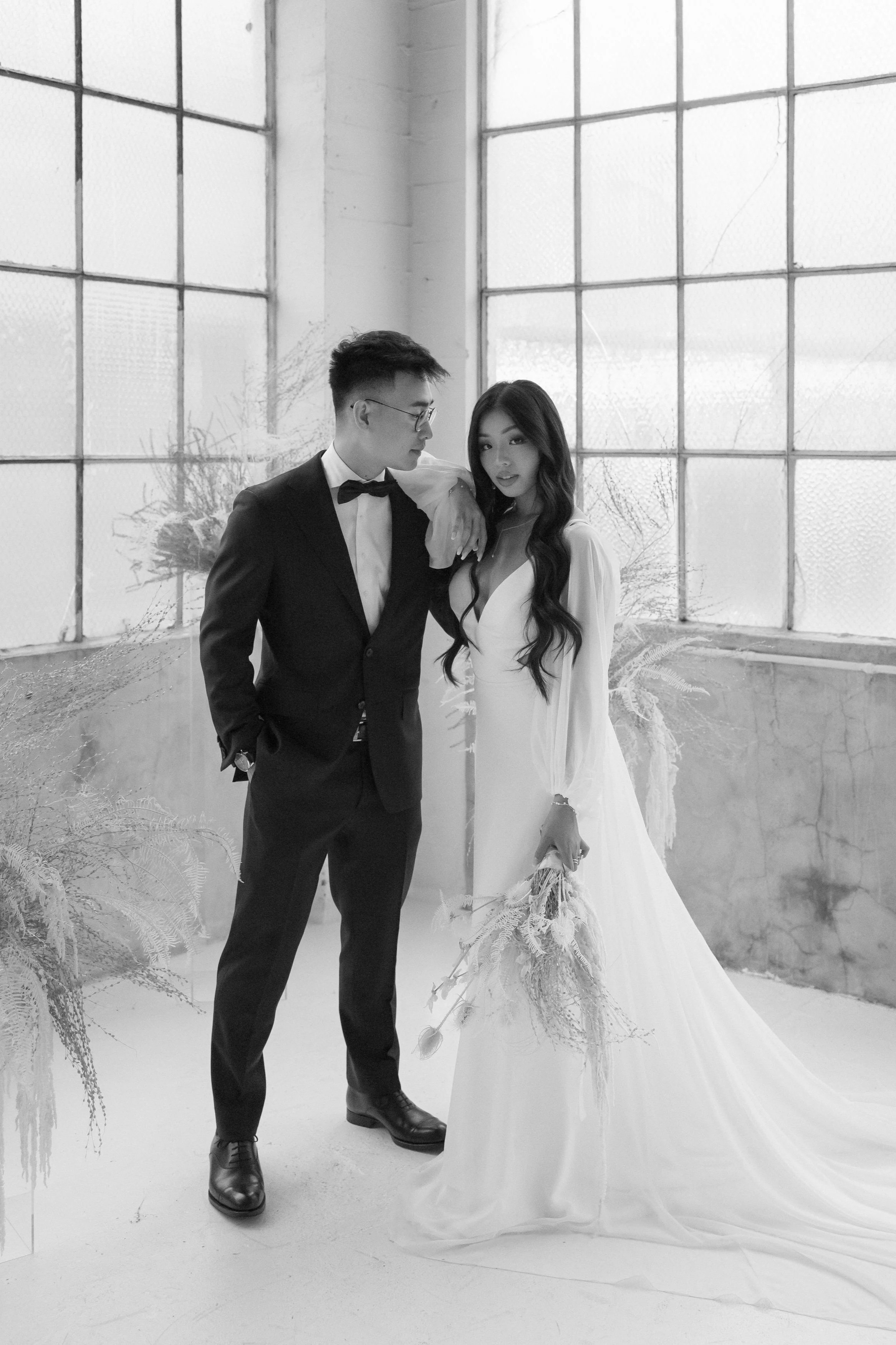 editorial wedding couple portrait in loft