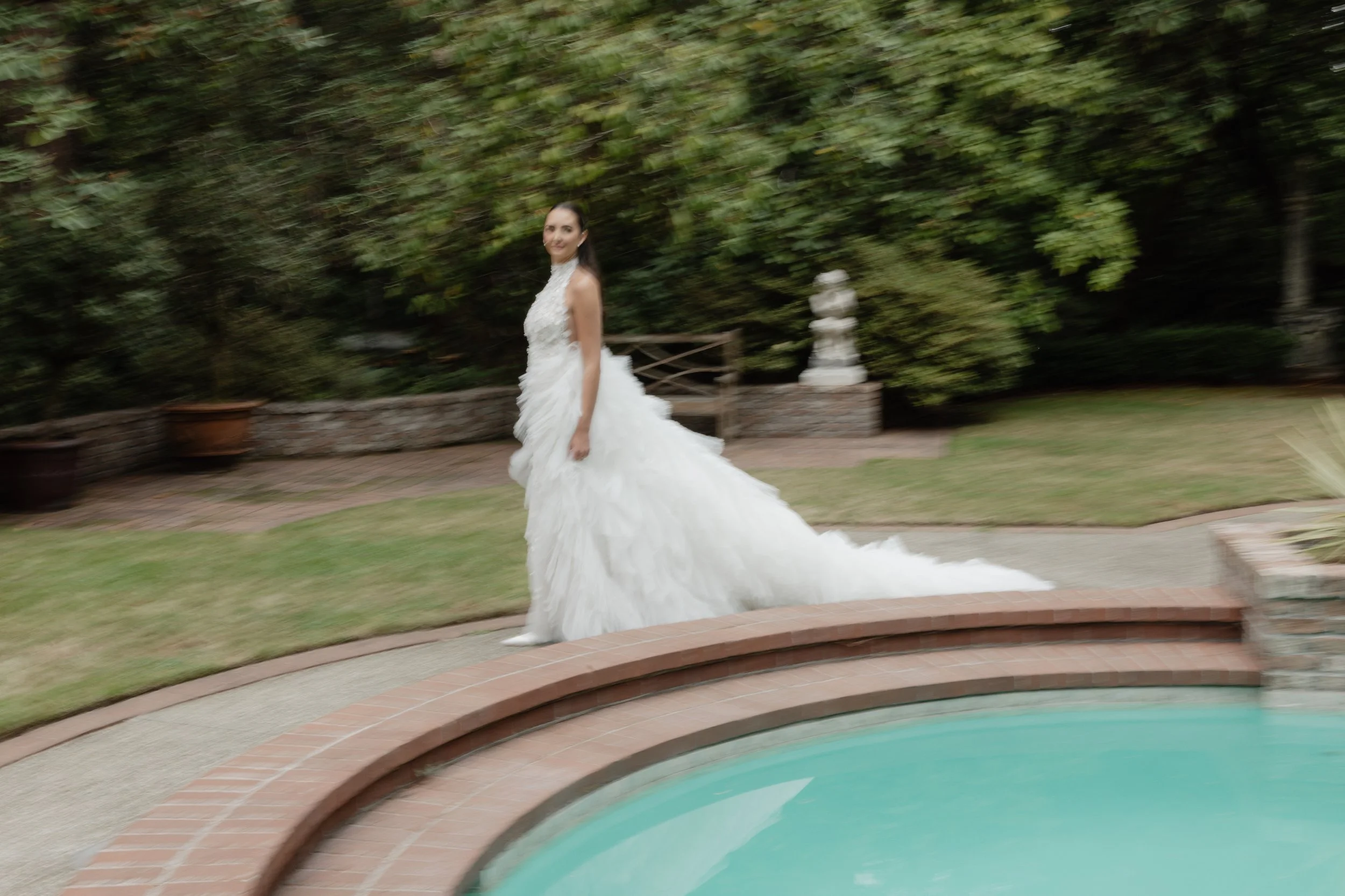 bride portraits beside the fountain at lakewold gardens
