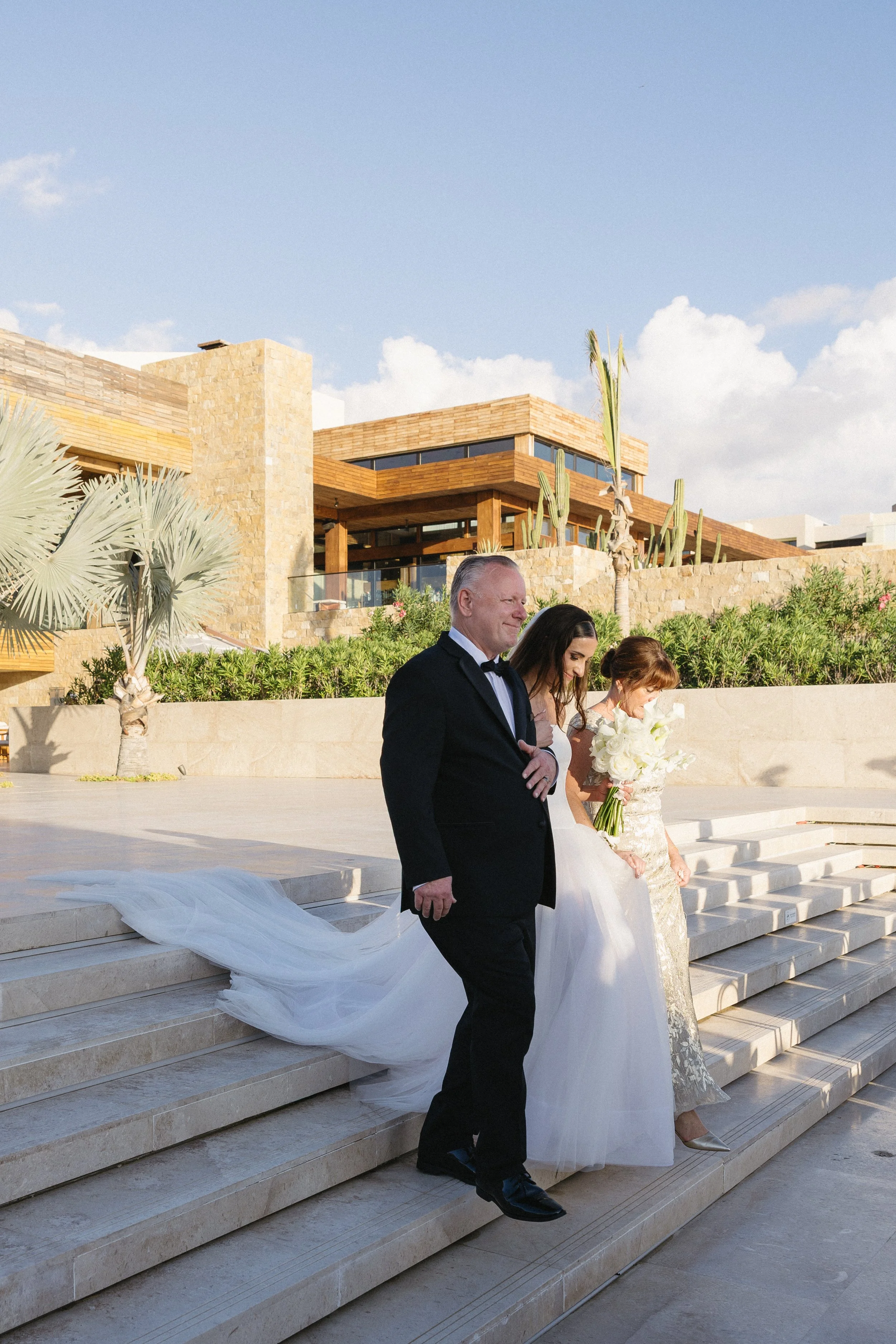 bride walking down the aisle at nobu los cabos