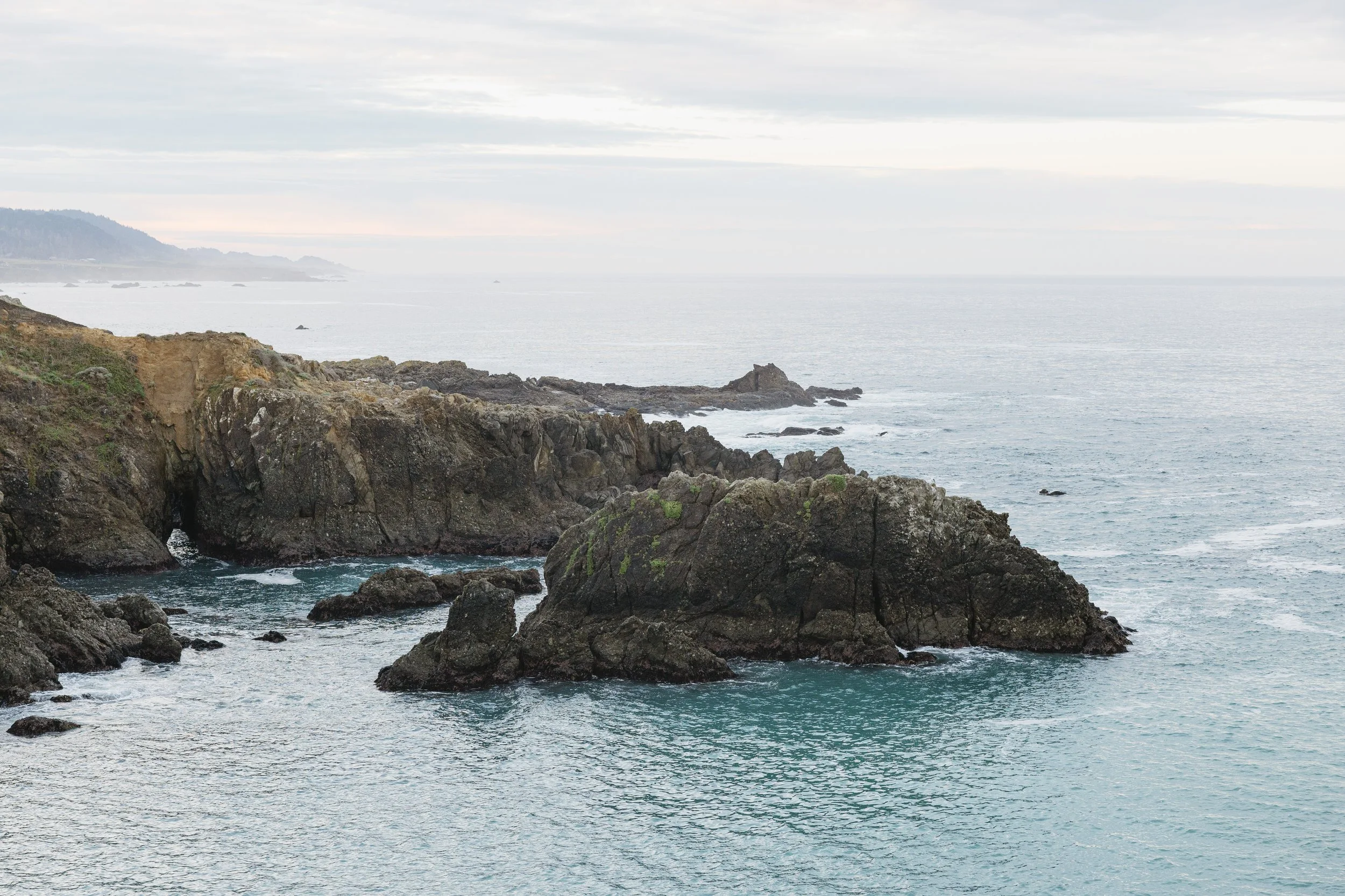 pacific ocean stretching beyond the cliffs at sea ranch lodge