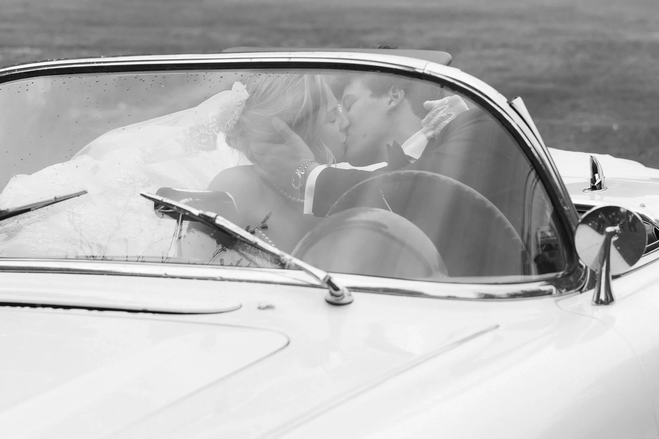 editorial bride and groom portrait in classic mercedes at berkshires luxury wedding