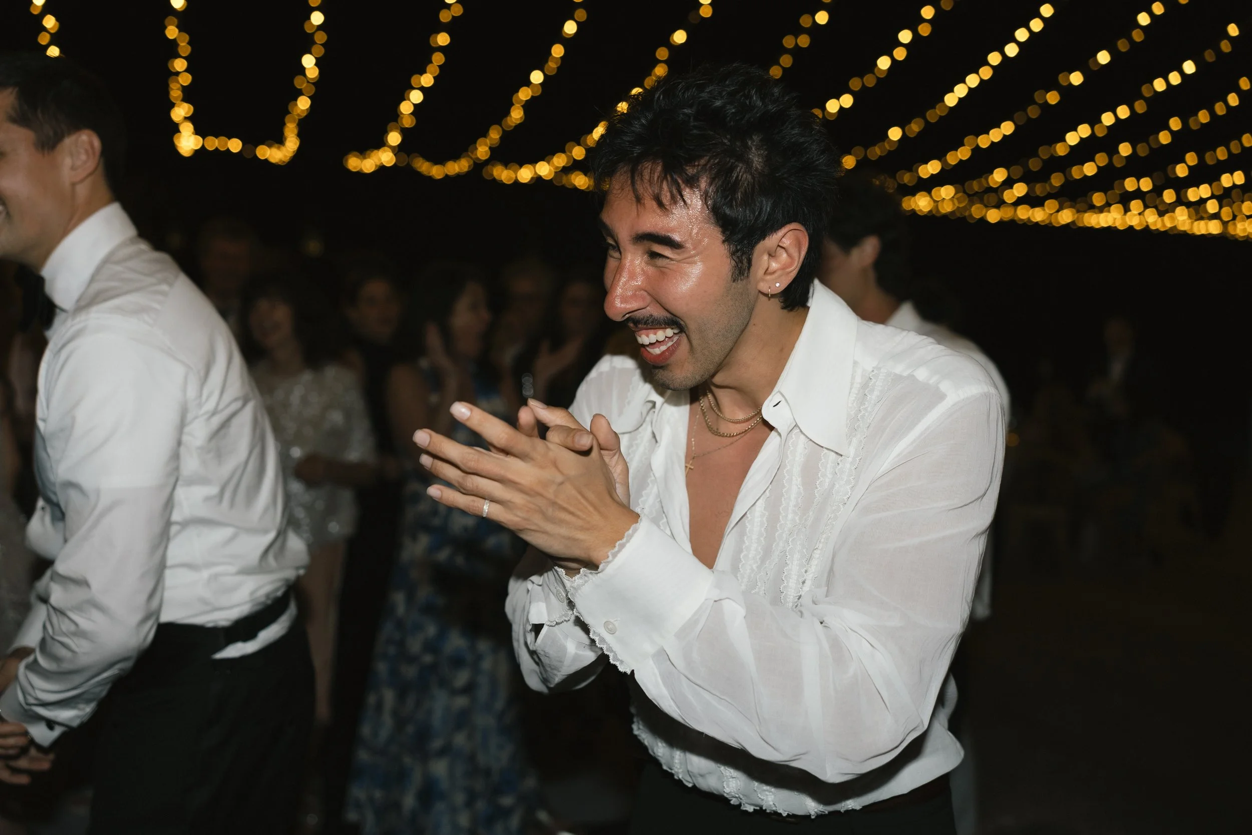 wedding guests dancing at destination wedding reception