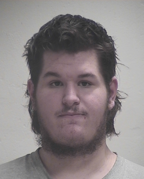 Man Charged in Connection in Ford Plant Threat