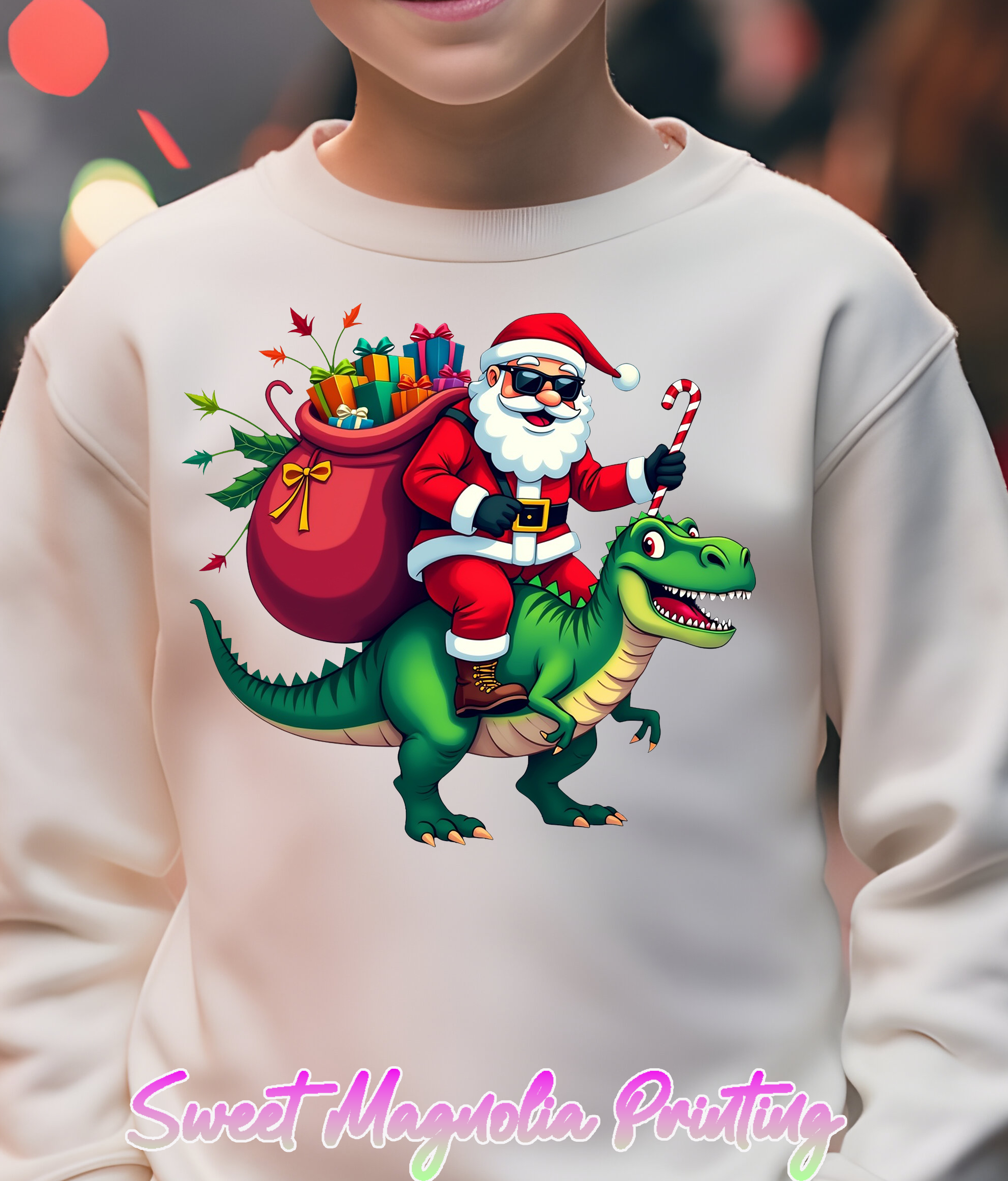 Santa on a dinosaur, cheerfully clutching a bag of presents, embodies a playful holiday spirit | Christmas Transfer | Sweet Magnolia Printing