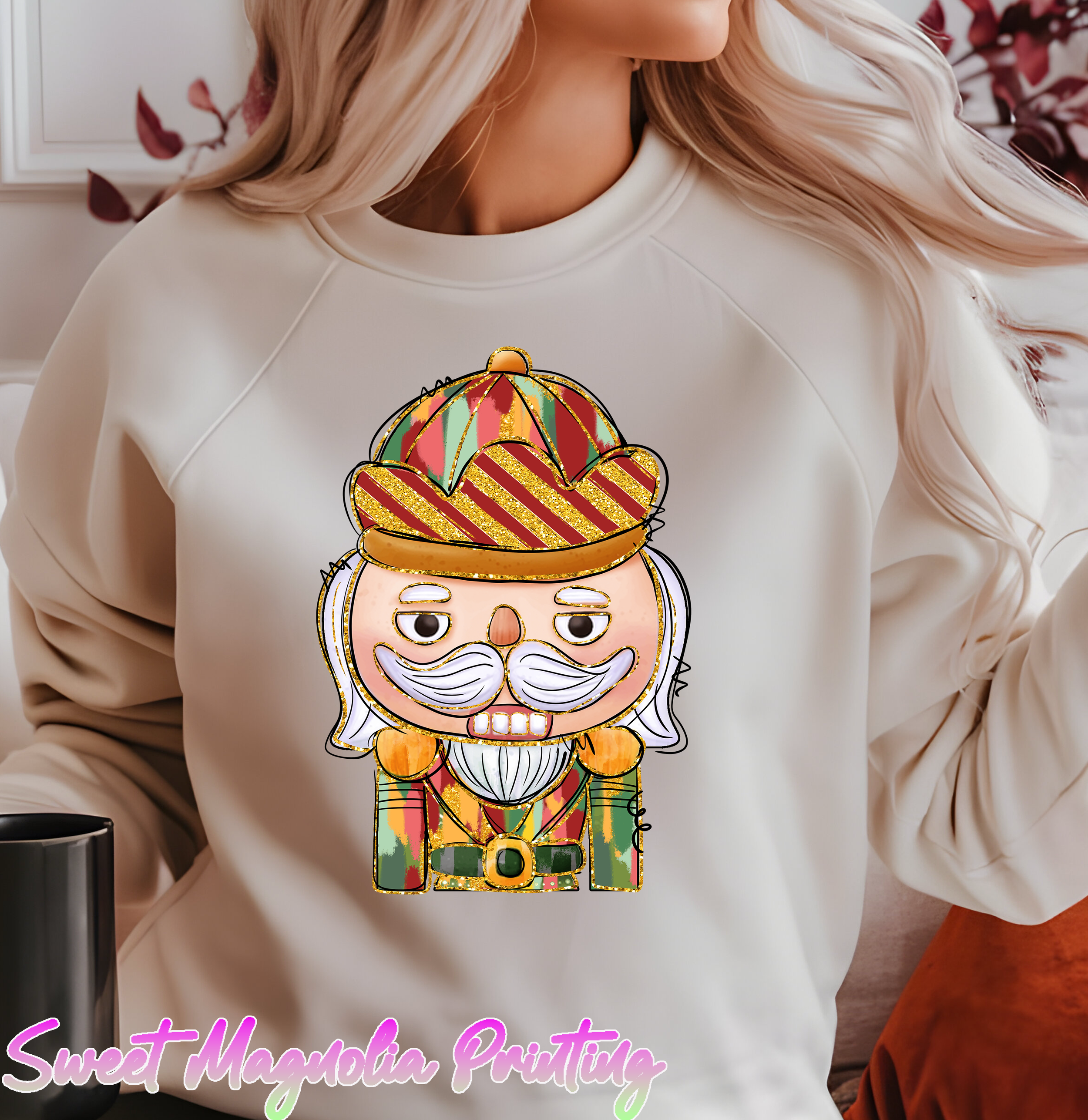 A colorful, cartoon-style nutcracker figure with a striped hat, smiling face, and a detailed white mustache | Christmas DTF Transfer | Sweet Magnolia Printing
