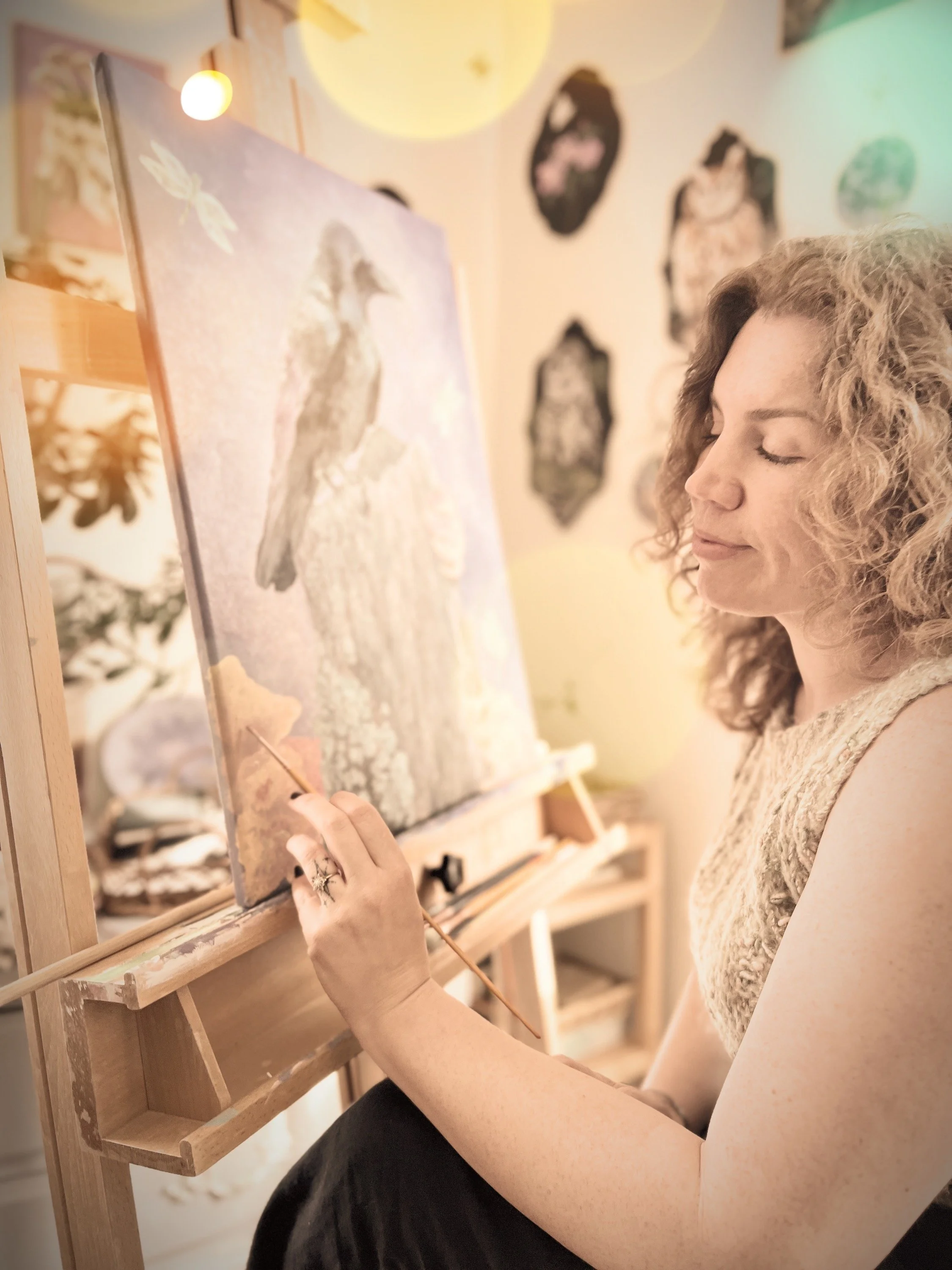 A photograph of Katie March in her art studio while living in Missouri.