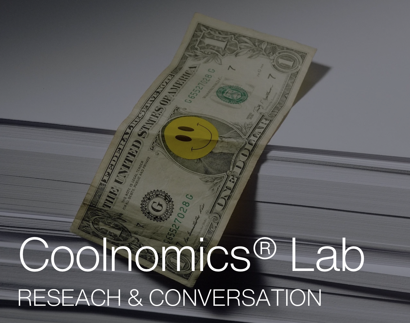 One dollar bill with a smiley face on a stack of papers, text "Coolnomics Lab" and "Research & Conversation."