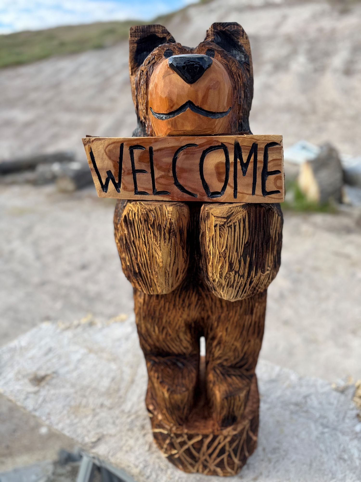 3_foot_bear_holding_welcome_sign_1.jpg