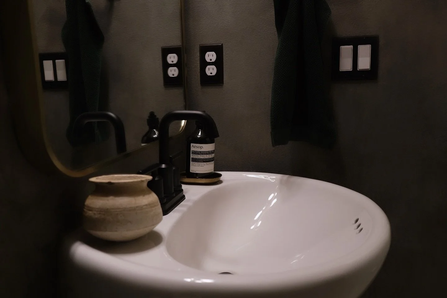 We completed this powder room project last winter but never got around to sharing it! The earthy color of this traditional lime wash created a beautiful weathered patina with subtle movement and natural color that softens with age. We love the organi