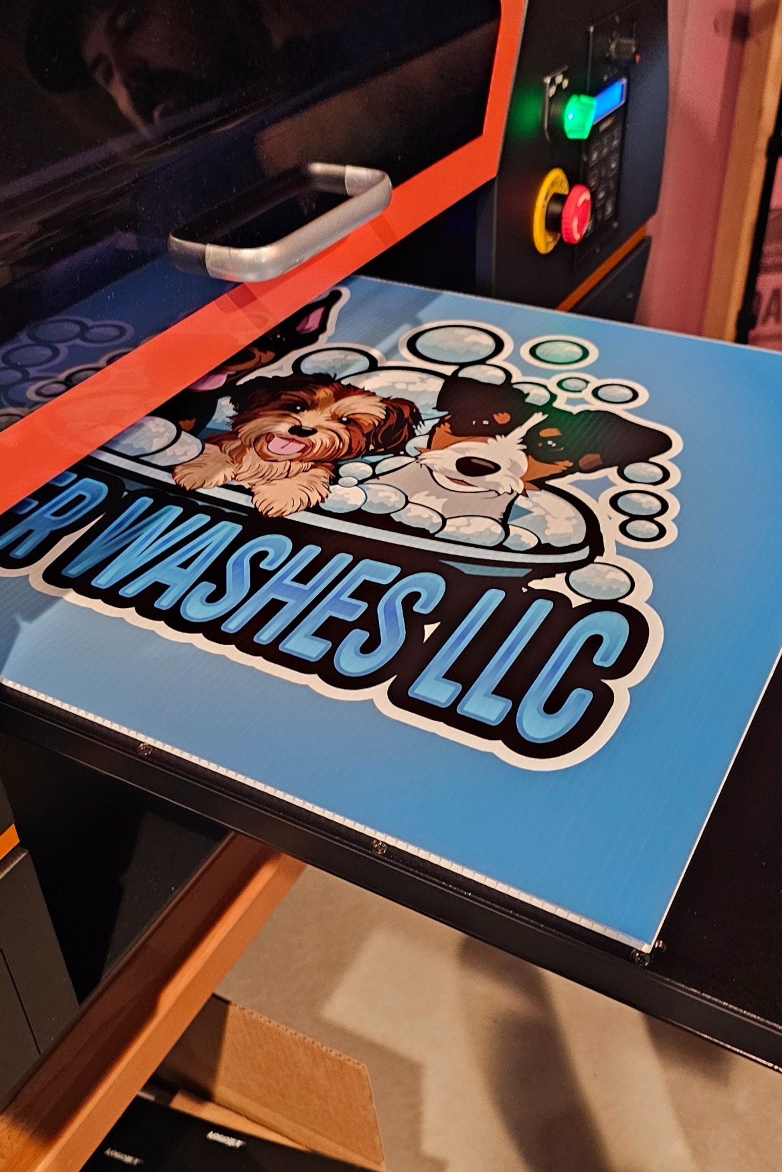 A custom yard sign being UV Printed for a local dog grooming business to put in their yard to notify their customers that they have arrived at the destination.