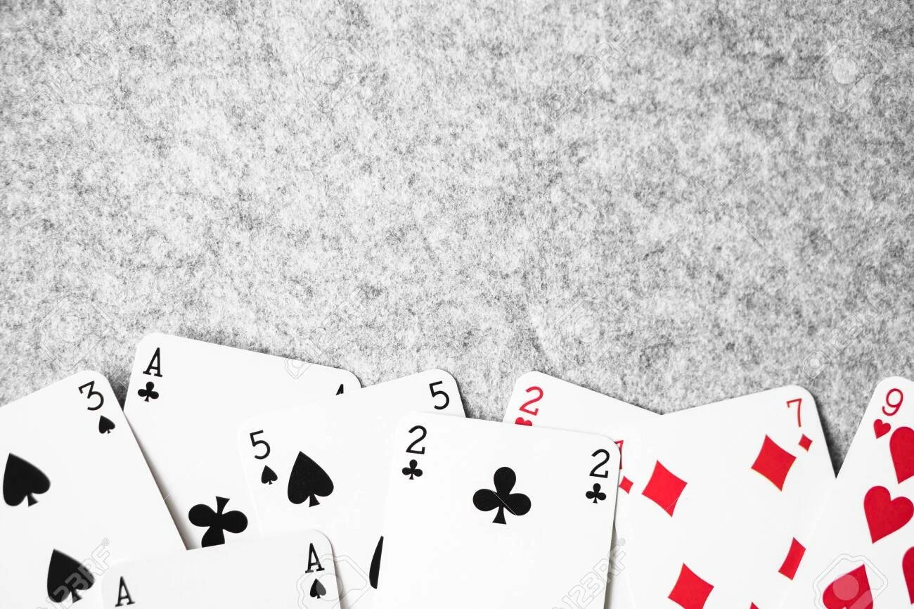150250821-casino-cards-background-with-s