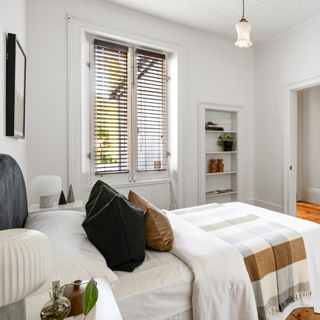 Home staging bedroom in a Fitzroy terrace styled to enhance natural light and warmth