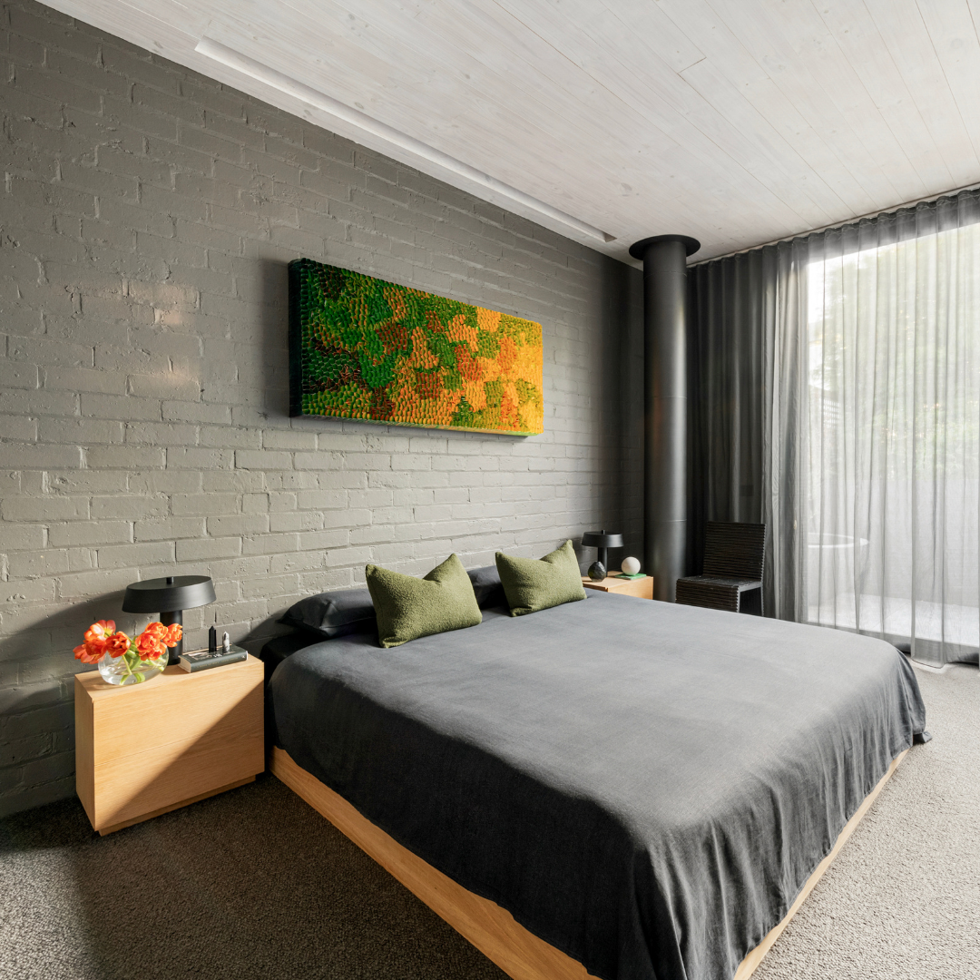 Partial styling of the master bedroom in an architectural home on Little Smith Street, Fitzroy