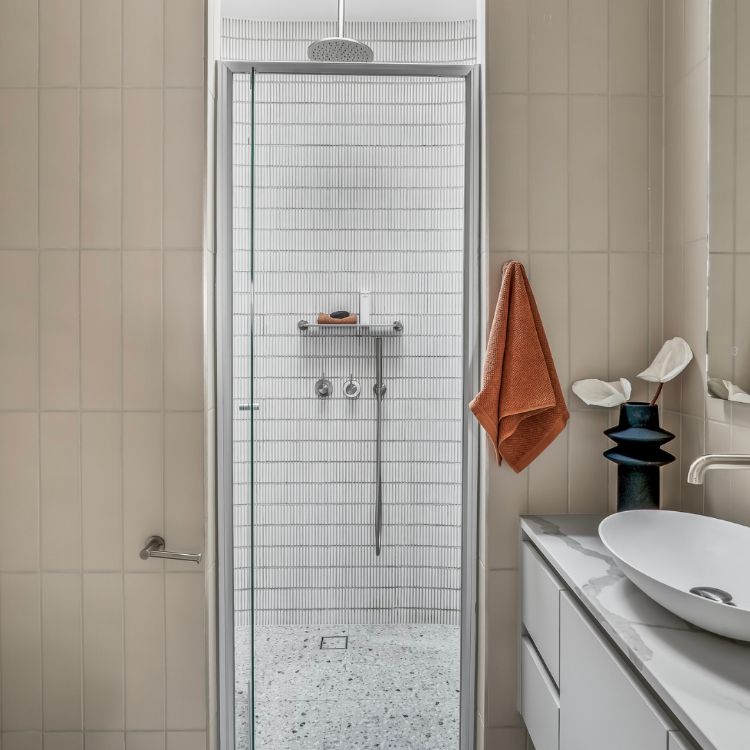Home staged modern bathroom in a Preston townhouse with clean, neutral finishes