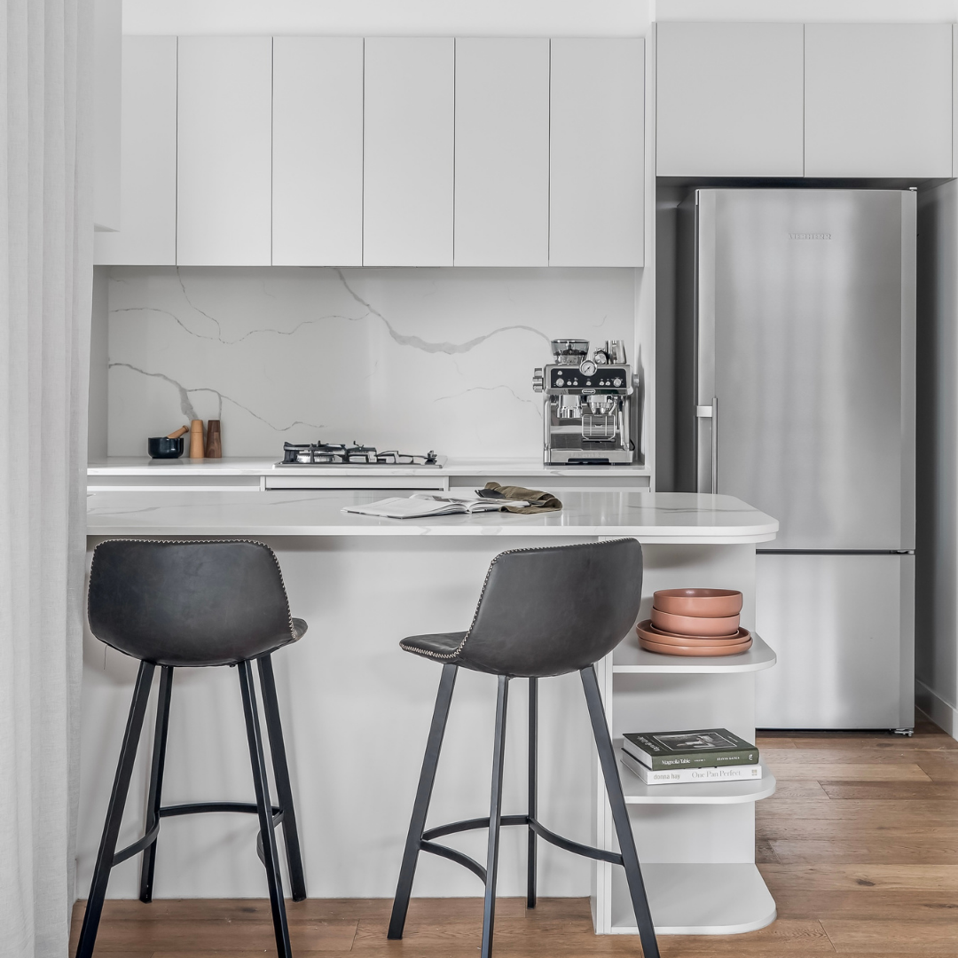 Home staged modern kitchen with island seating in a Melbourne house