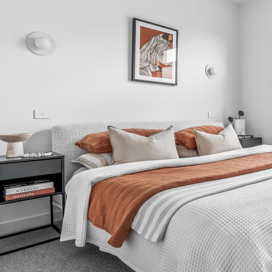 Home staging bedroom in a Preston townhouse styled with warm tones to create a welcoming feel.