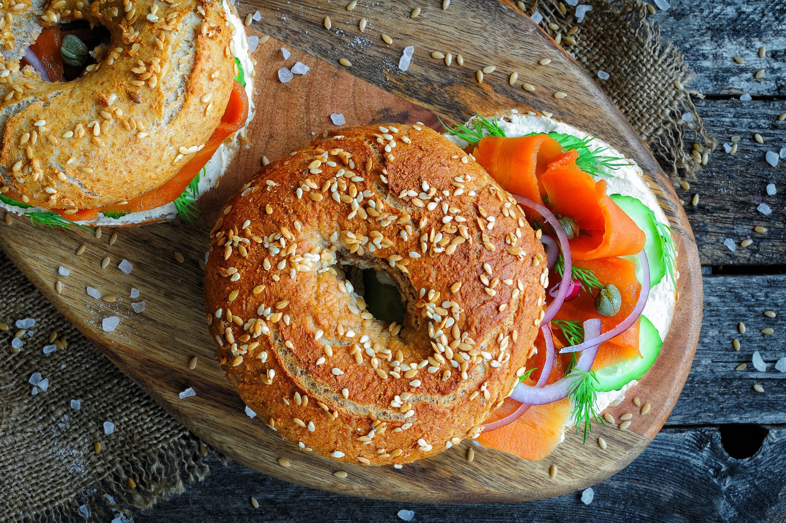 sesame bagel with carrot lox and dairy free cream cheese
