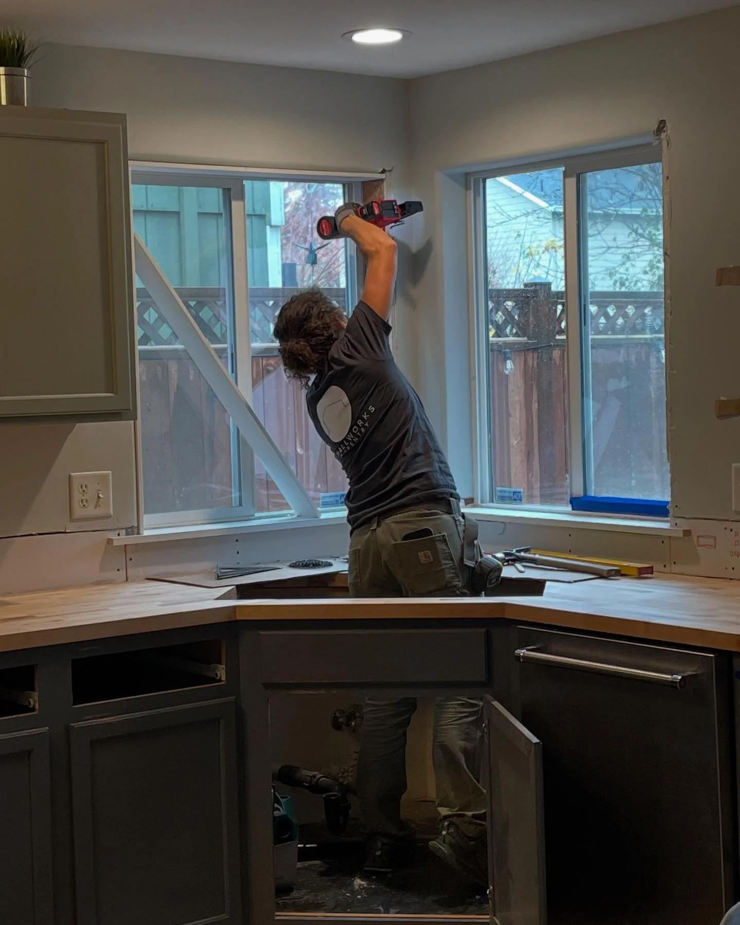 A very great 1.75 weeks updating a kitchen for some very great people (and baby and dog). Our scope was demo, butcher block counter tops, new sink, new window casing/trim, two custom floating shelves and tile. The homeowners will paint (#idontpaint) 
