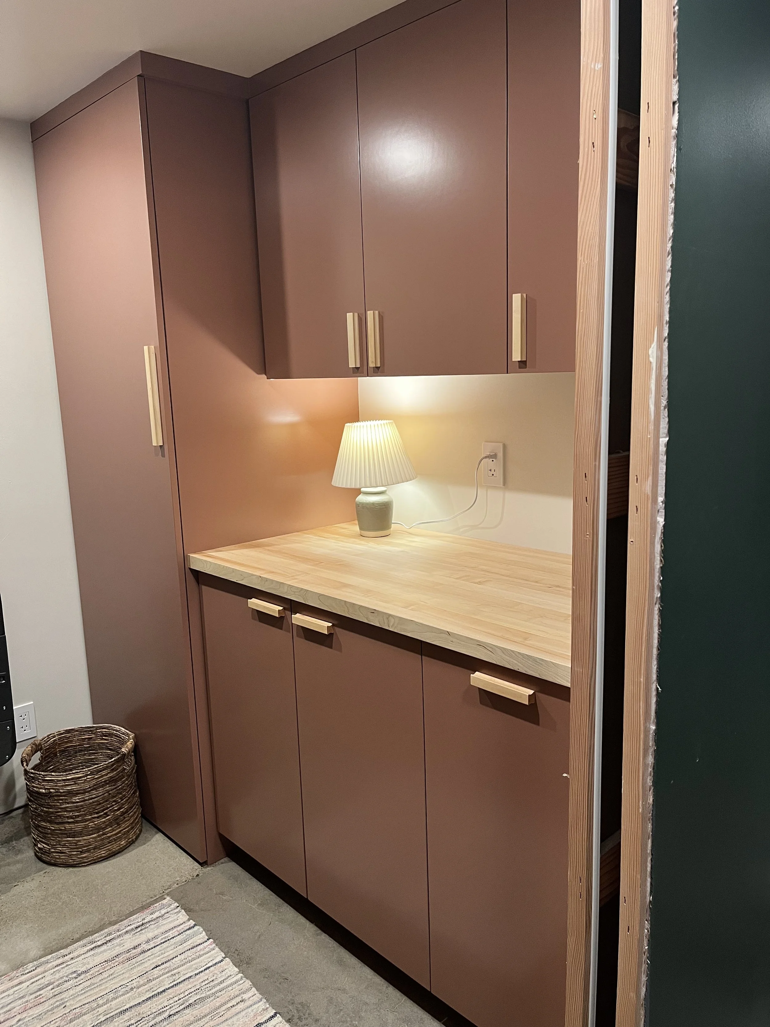 Custom cabinets for a basement laundry room remodel. 