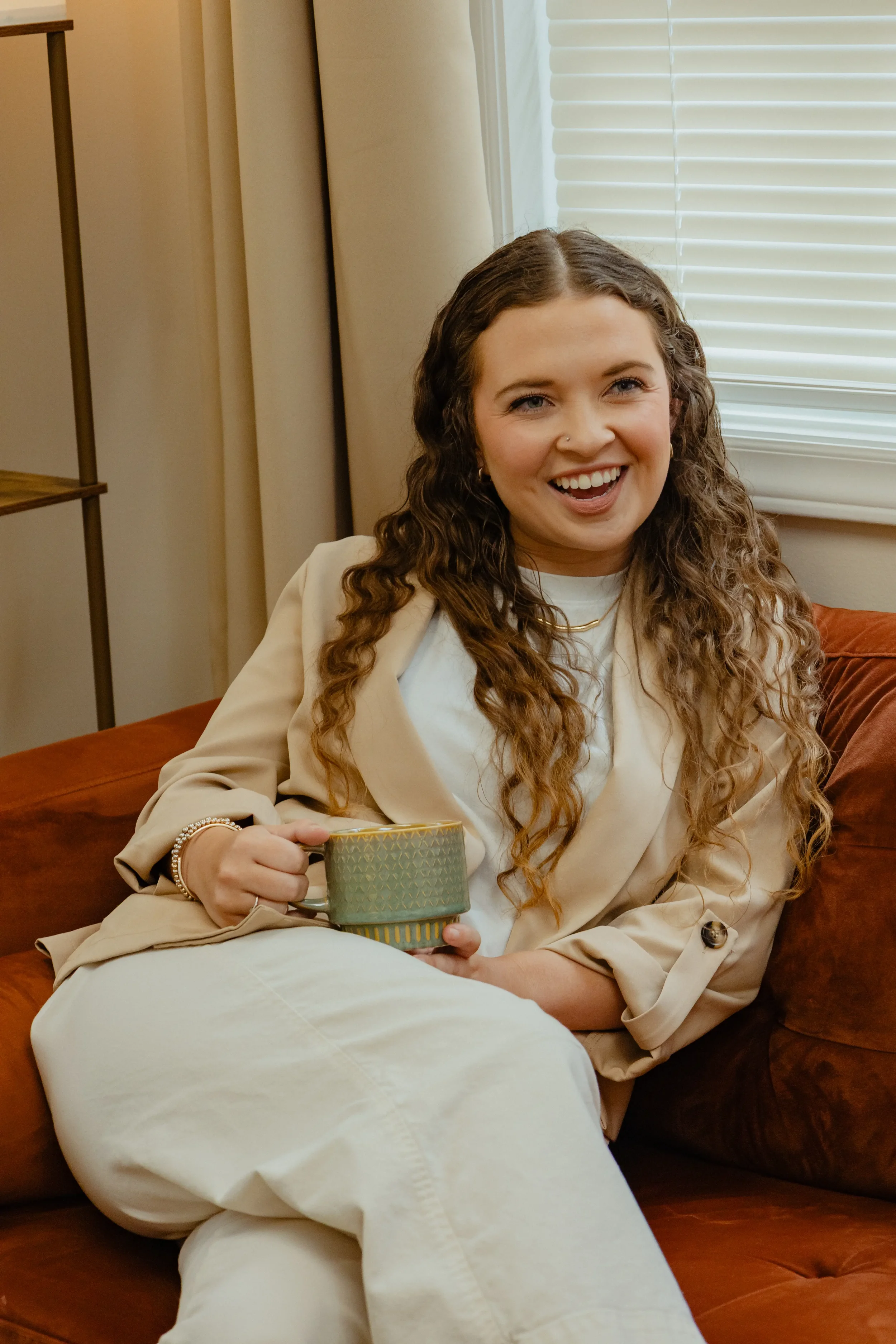 Therapist Kaitlyn Skipper smiling and actively listening to someone off-screen