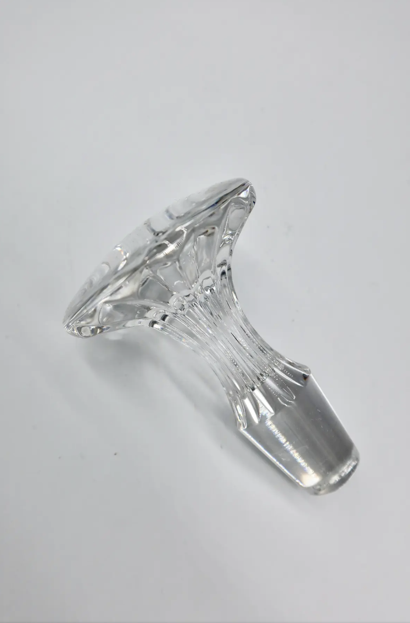 Tall, stunning glass decanter perfect for holding your favorite liquor or staged on a bar cart. Located in Austin, Texas.