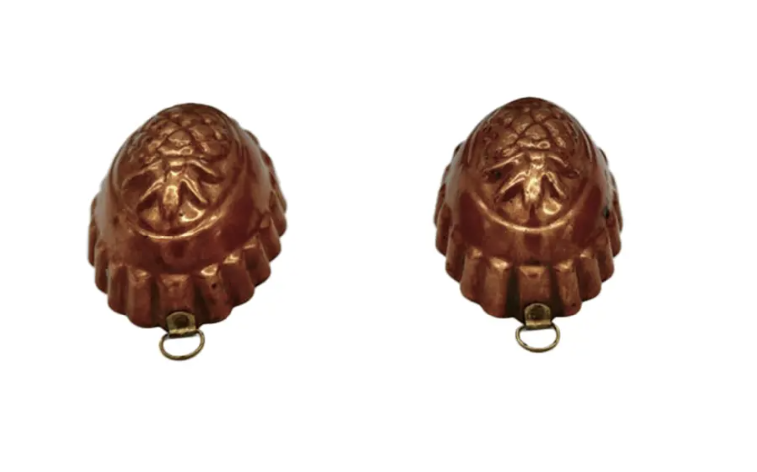 Set of early 1920's French copper molds. They are tin lined, each with its original hanger. Located in Austin, Texas.