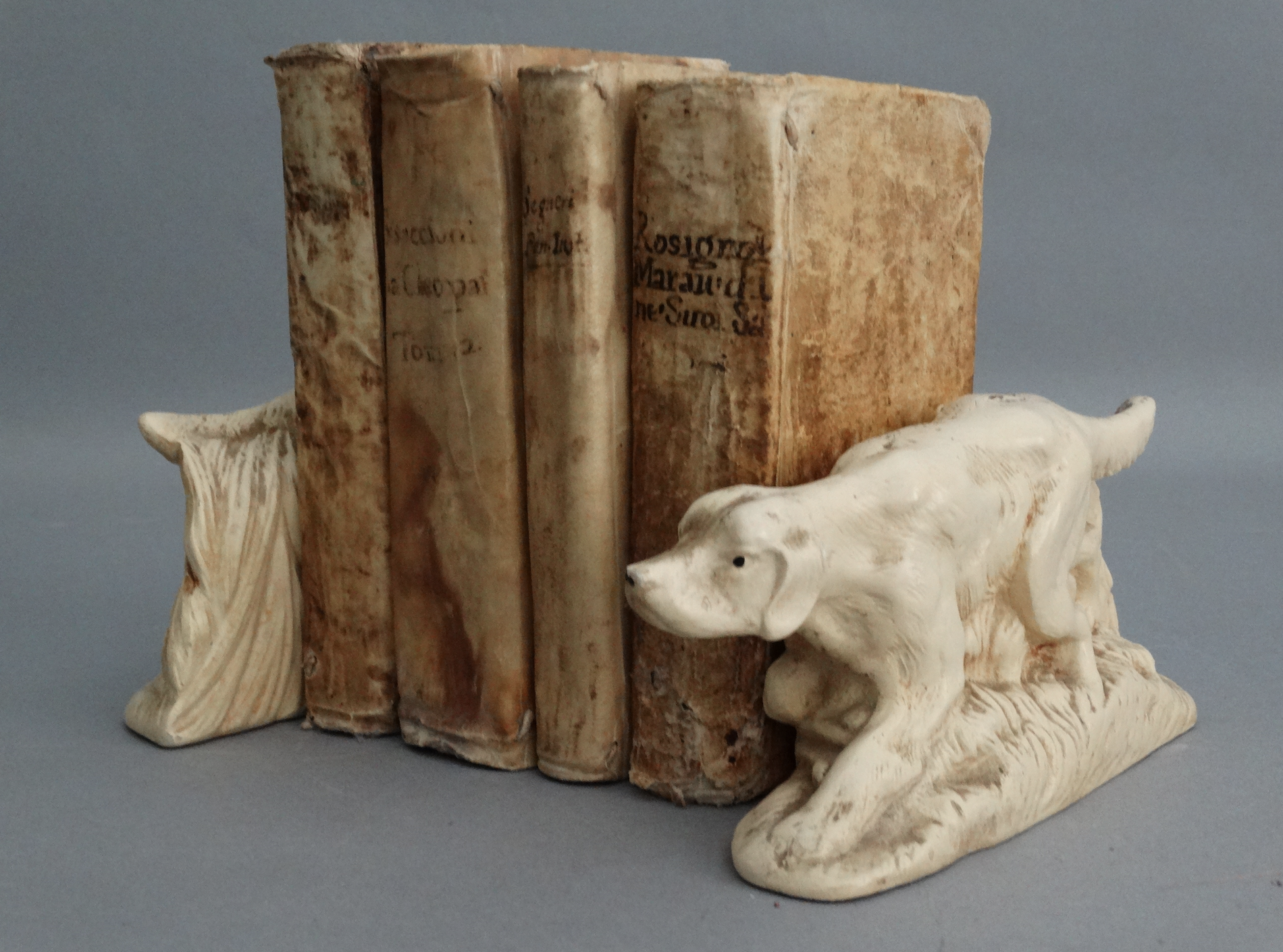A vintage pair of McCoy bookends of sporting or hunting dogs (likely settlers or spaniels). Located in Austin, Texas.
