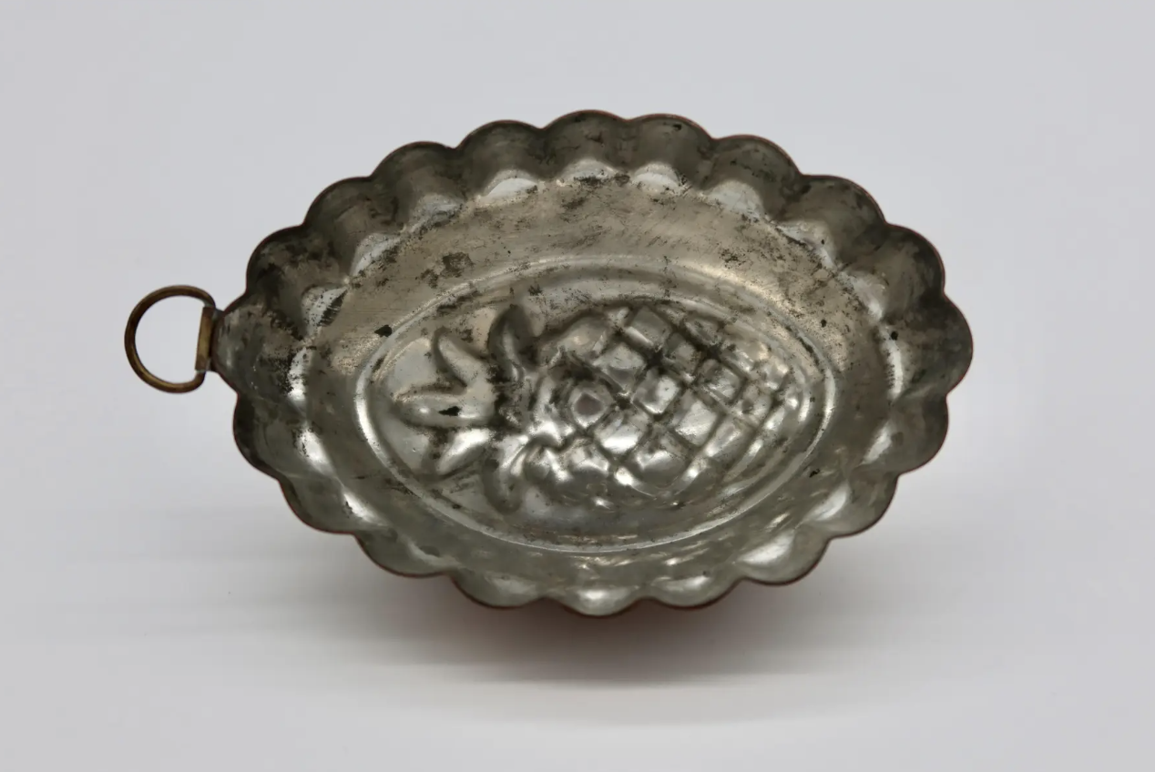 Set of early 1920's French copper molds. They are tin lined, each with its original hanger. Located in Austin, Texas.