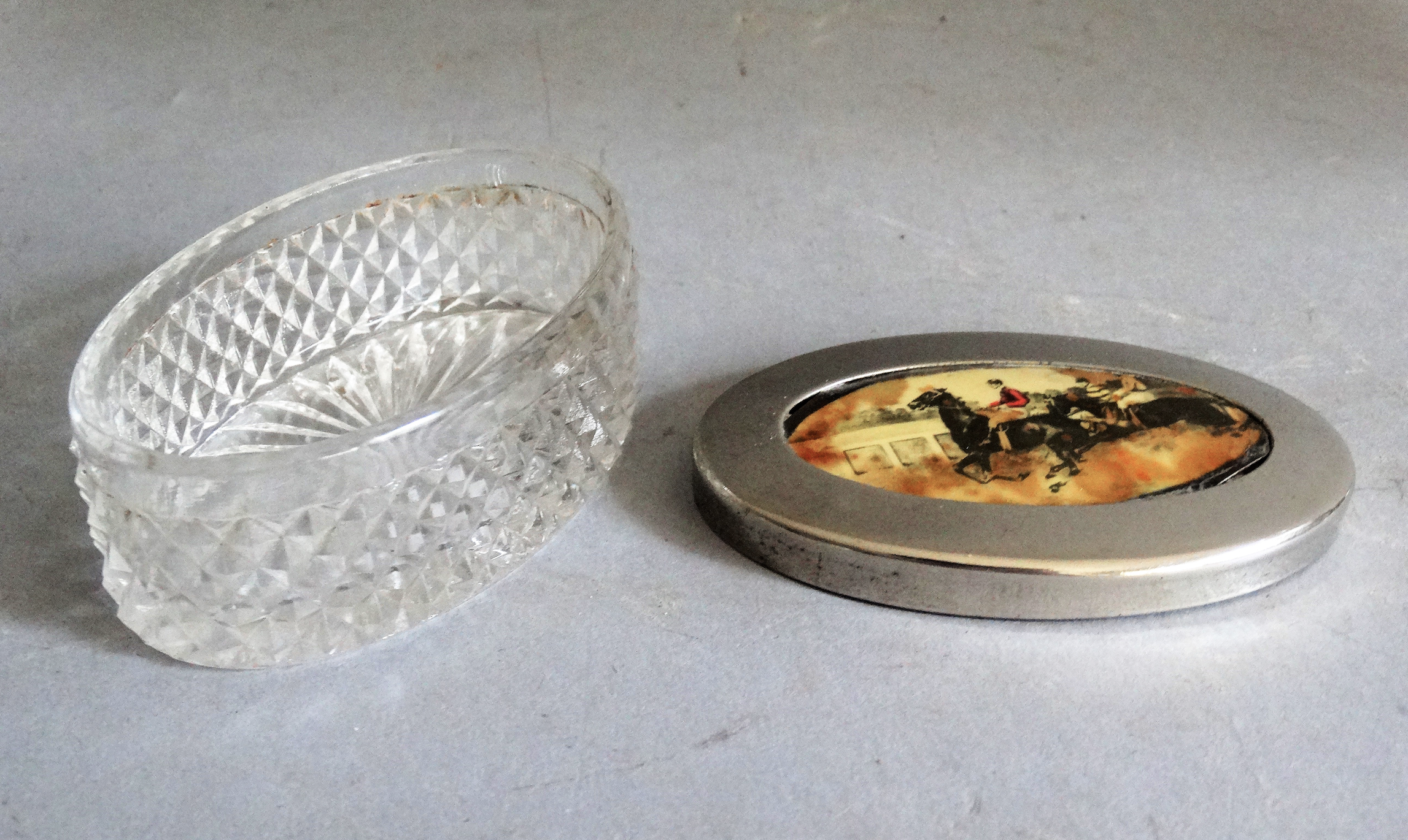 An early 20th-century English crystal and silver-plate box with an equestrian scene. Located in Austin, Texas.