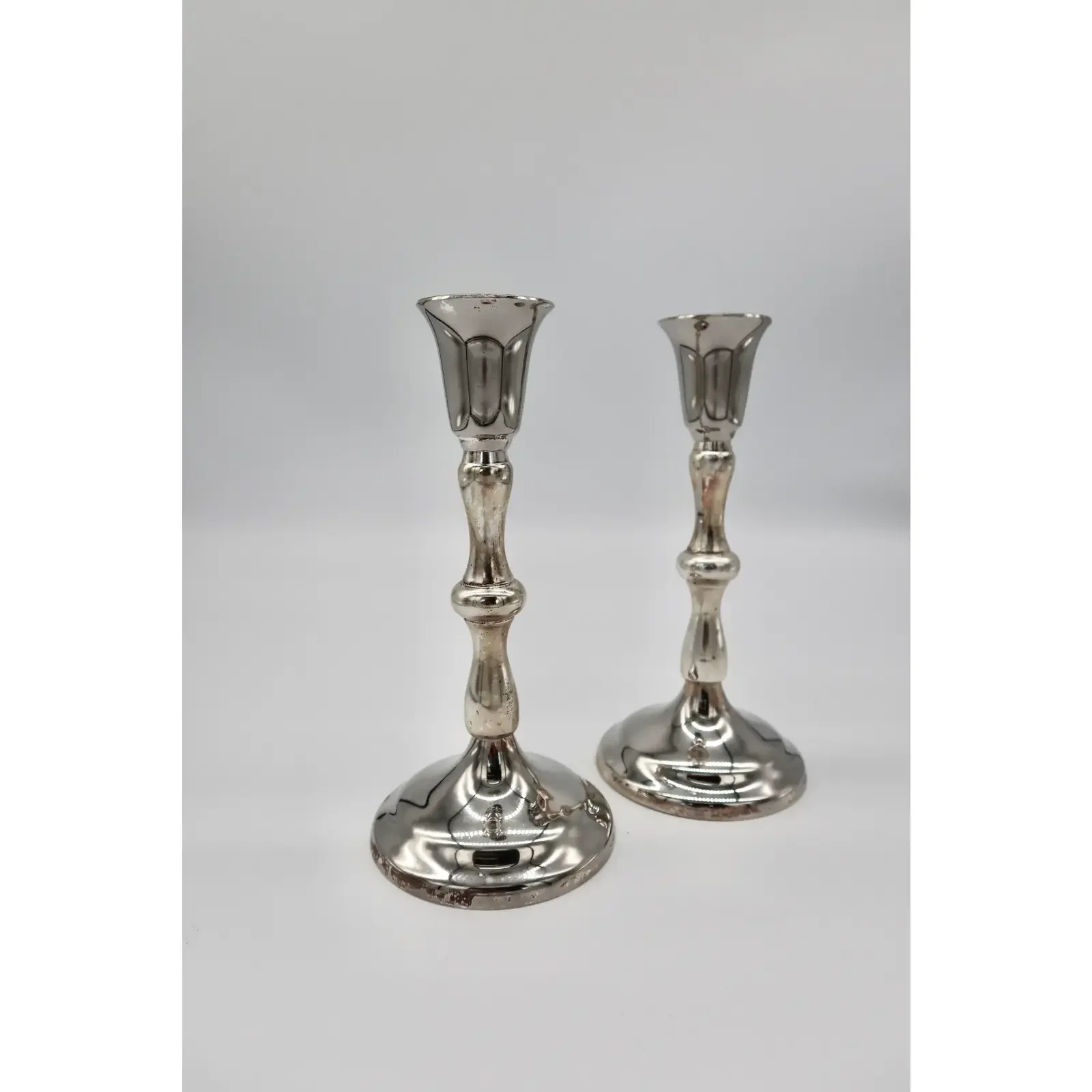 pair-of-vintage-silver-tone-metal-candlesticks-7904.webp