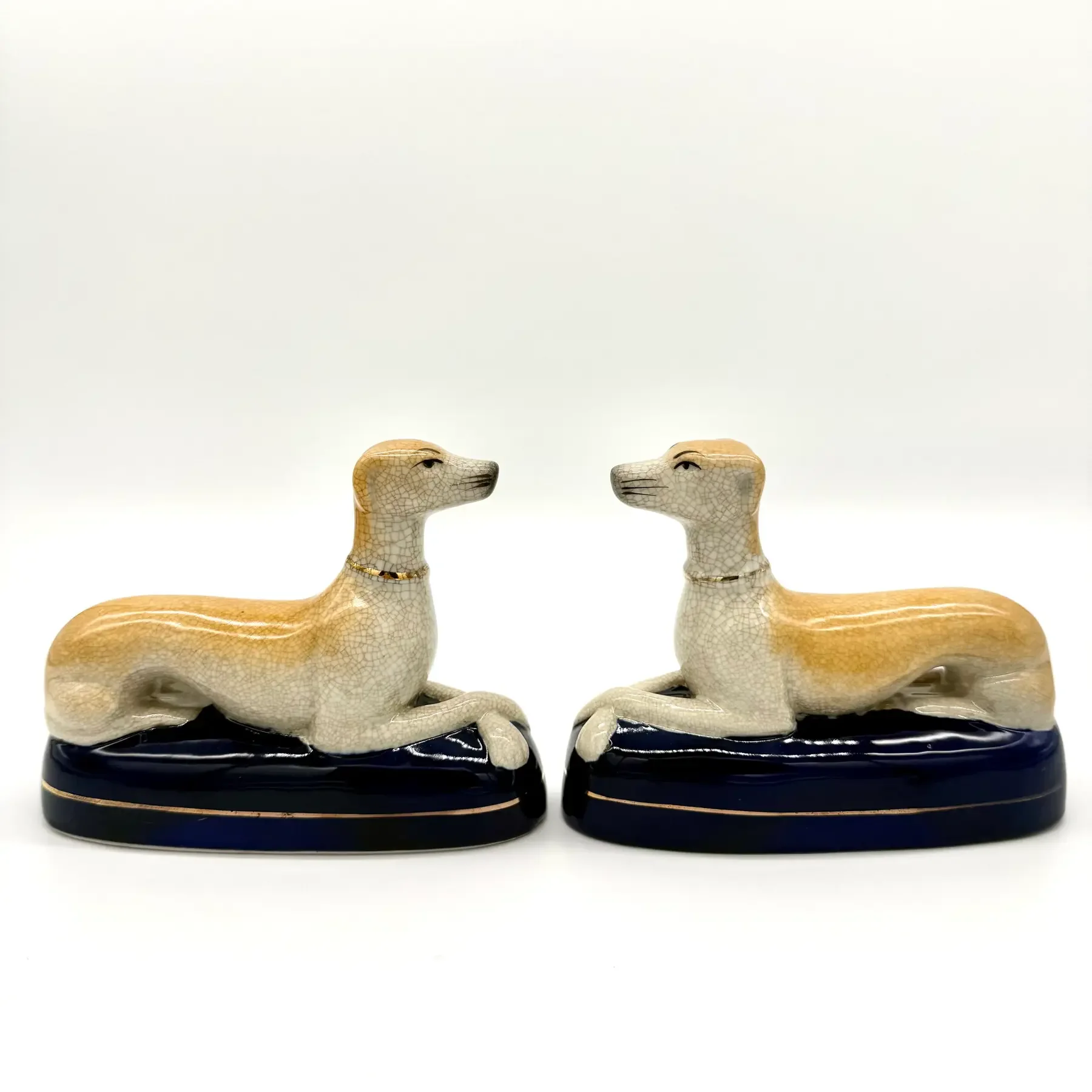 mid-century-staffordshire-style-whippet-or-greyhound-ceramic-figurines-or-bookends-a-pair-3300.webp