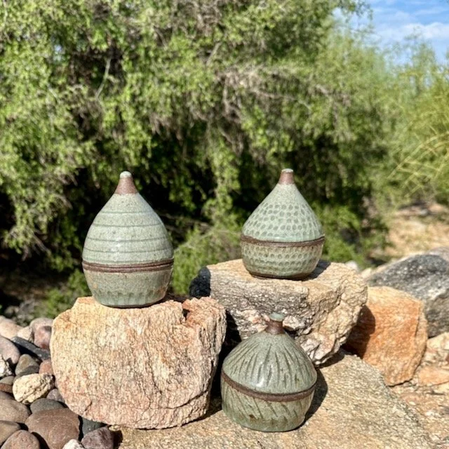 3 pointy lidded jars, black mountain clay