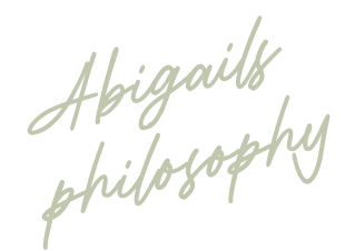 Text reading 'Abigail philosophy' in cursive script on a black background.