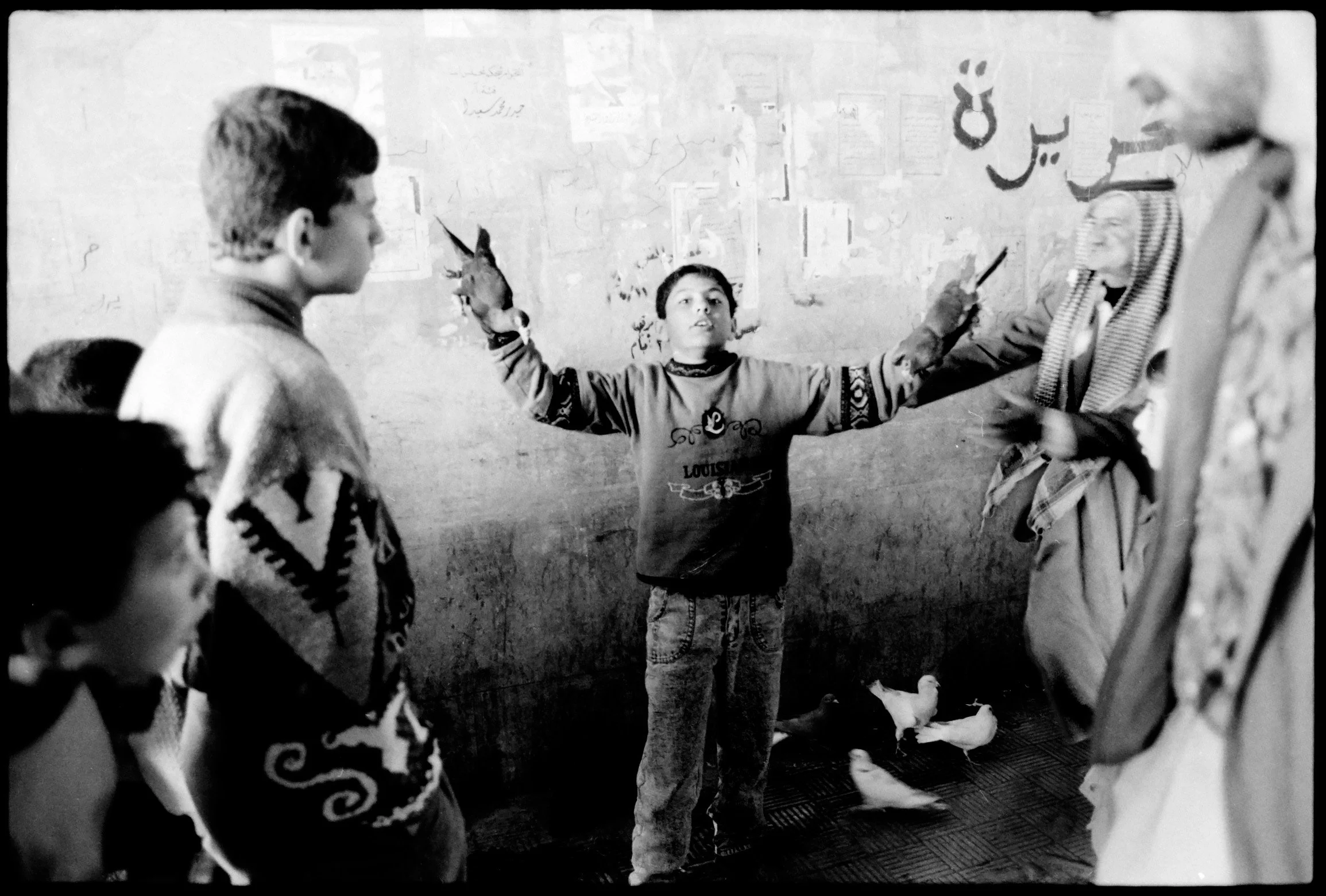 kurdish boy w birds.jpg