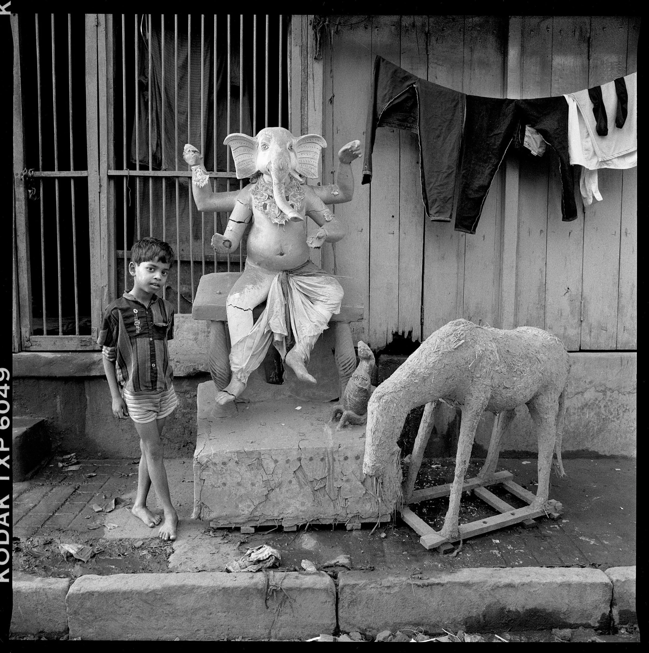  Boy and Ganesh,
kumartuli, Calcutta