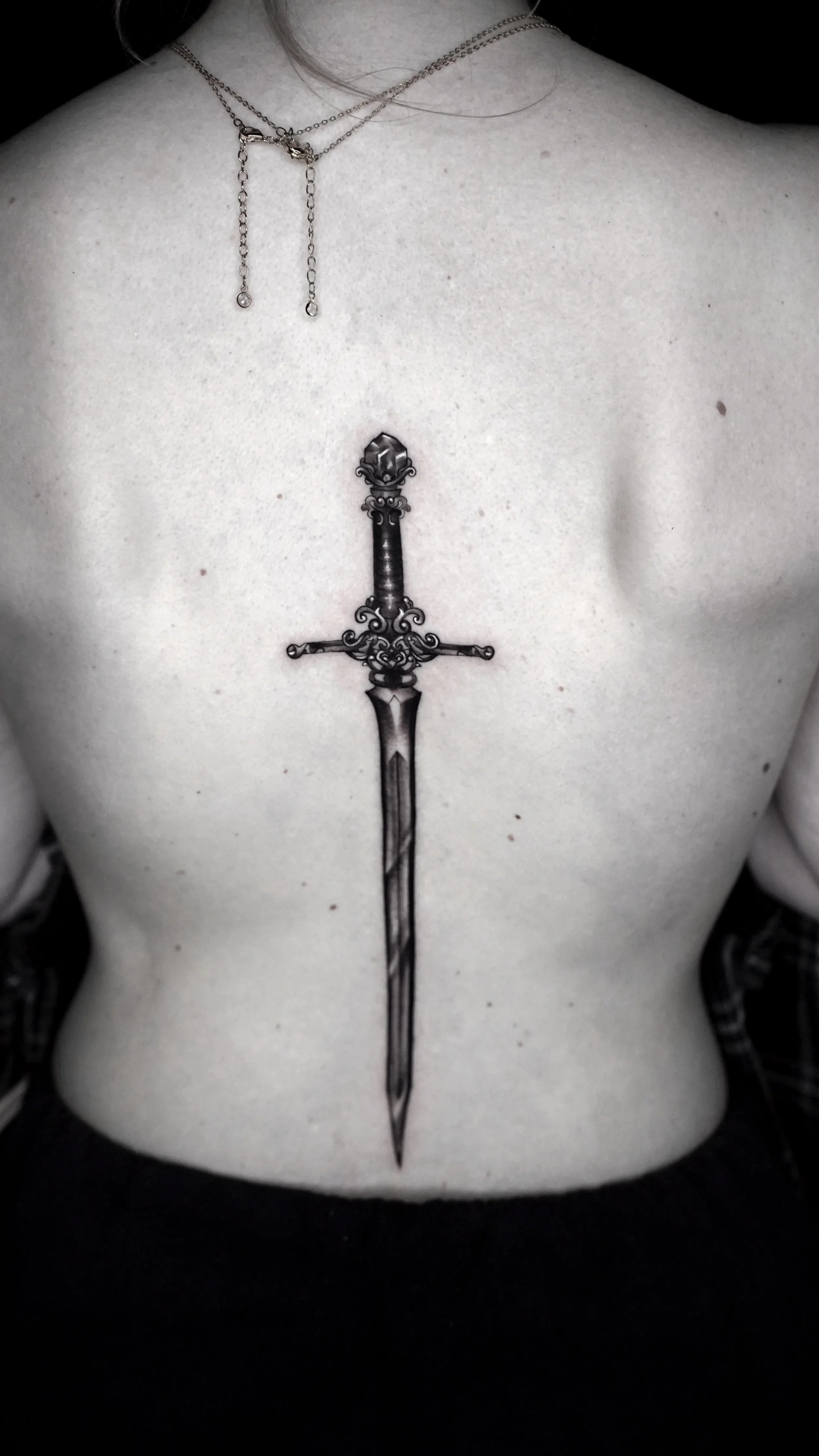 Goldryn Sword Black and Grey Back Tattoo