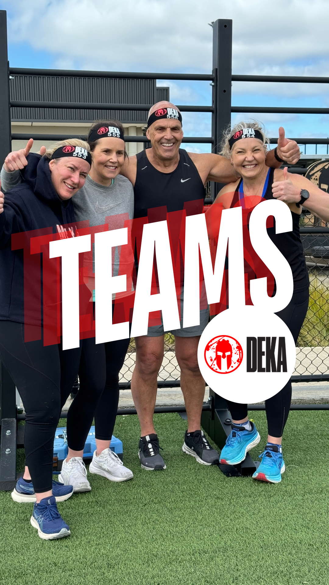 Four people wearing workout gear and DEKA-branded headbands pose together outdoors, smiling and giving thumbs up. The word 'TEAMS' and DEKA logo are overlaid on the image. They stand on an artificial turf surface with fencing and a building in the ba