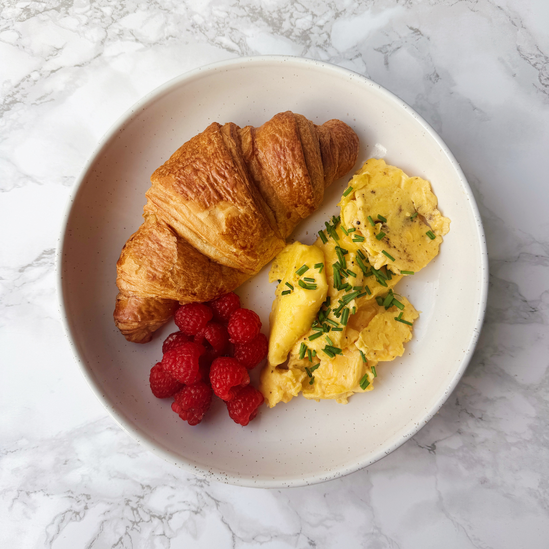 Croissant, Eggs &amp; Fruit