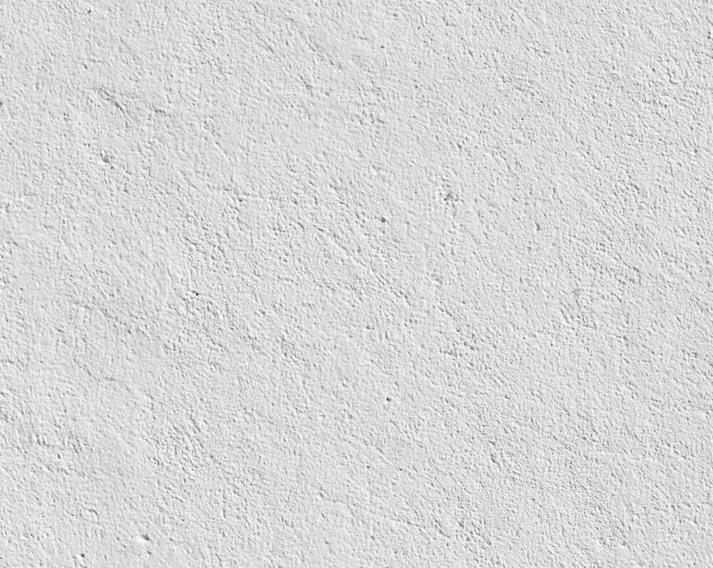 Close-up of a white rendered wall.