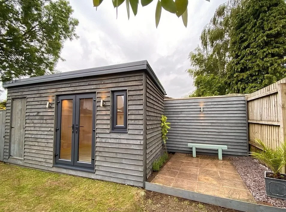 Garden room with storage and outdoor seating in Newport