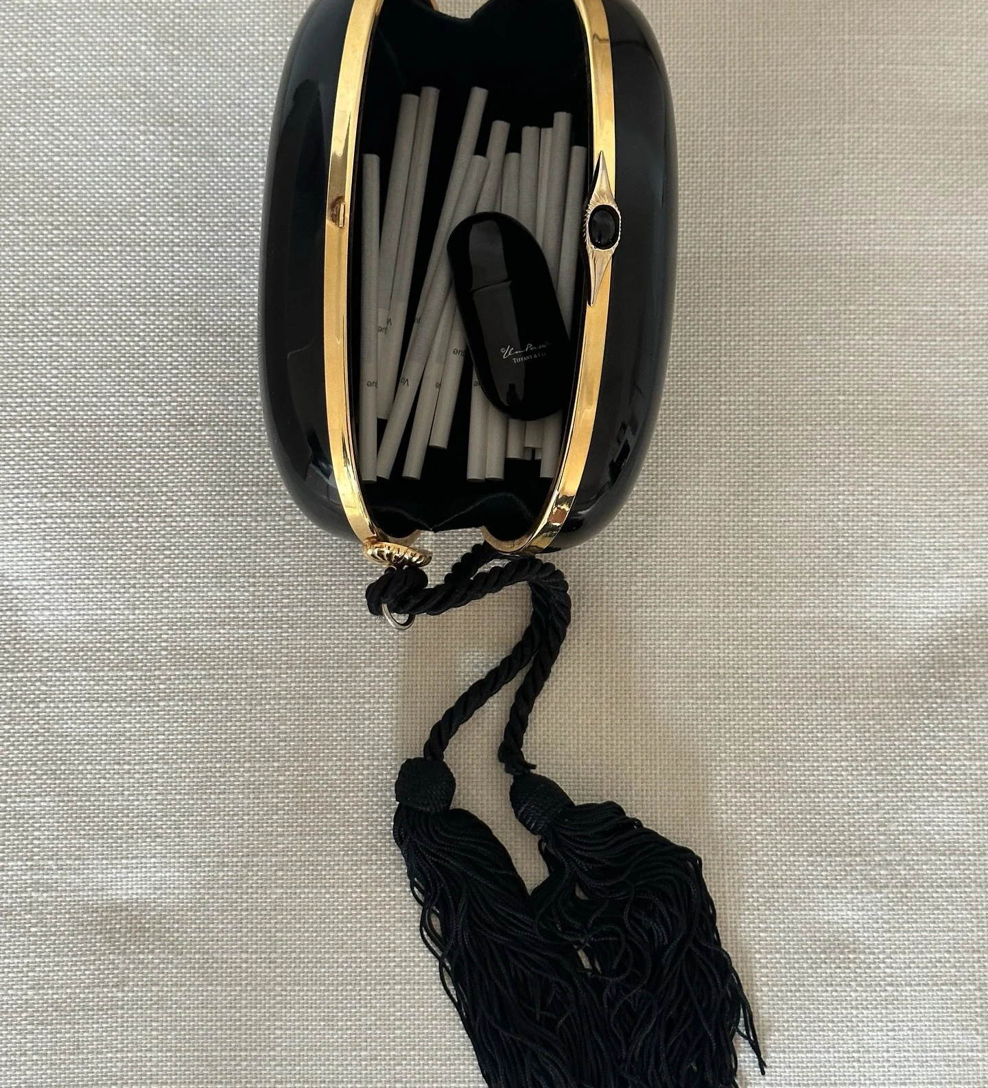 Our recently sold vintage tassel clutch and Tiffany &amp; Co. Elsa Peretti lighter currently online