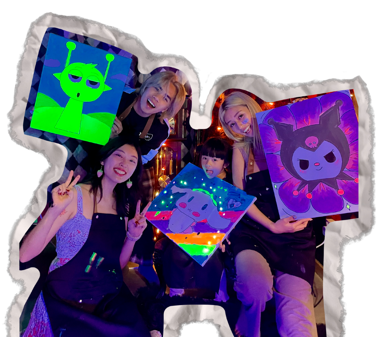 Four women and a child holding colorful, glowing artwork of cartoon characters, making peace signs and smiling, with a dark background and decorative lighting.